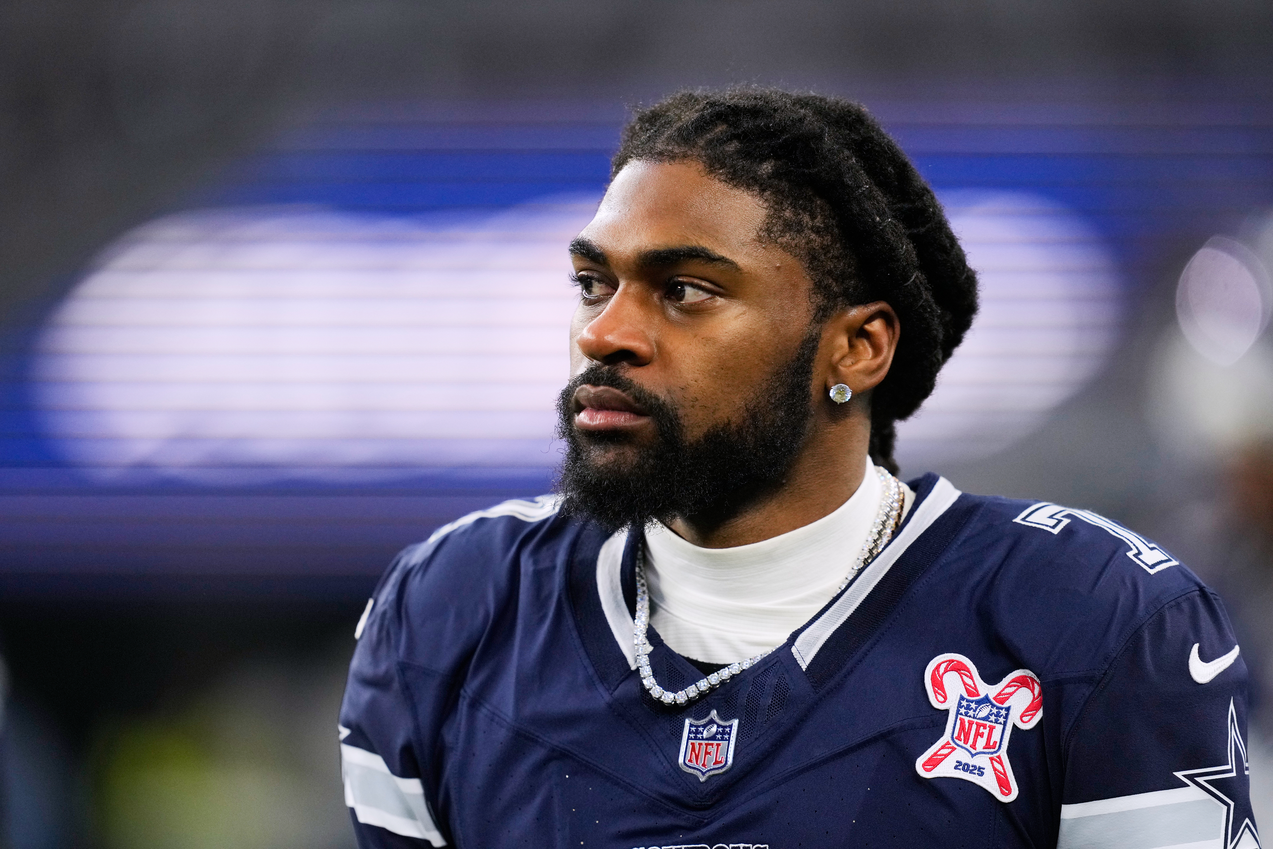 FILE - Dallas Cowboys cornerback Trevon Diggs (7) walks along the sideline during the first half of an NFL football game against the Los Angeles Chargers, Dec. 21, 2025, in Arlington, Texas. 