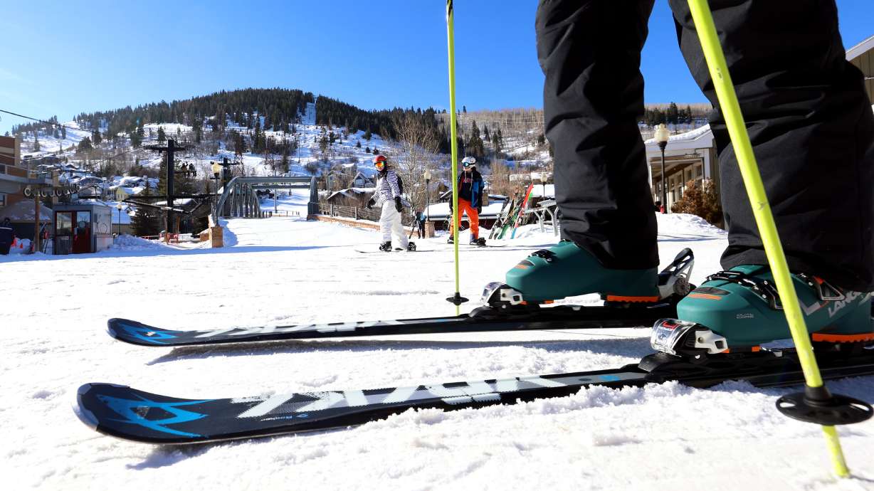 Skiers and Snowboarders move to get on a lift in Park City on Jan. 11, 2022. One ski resort company already has its sights set on what the coming "Super El Niño " is expected to deliver.