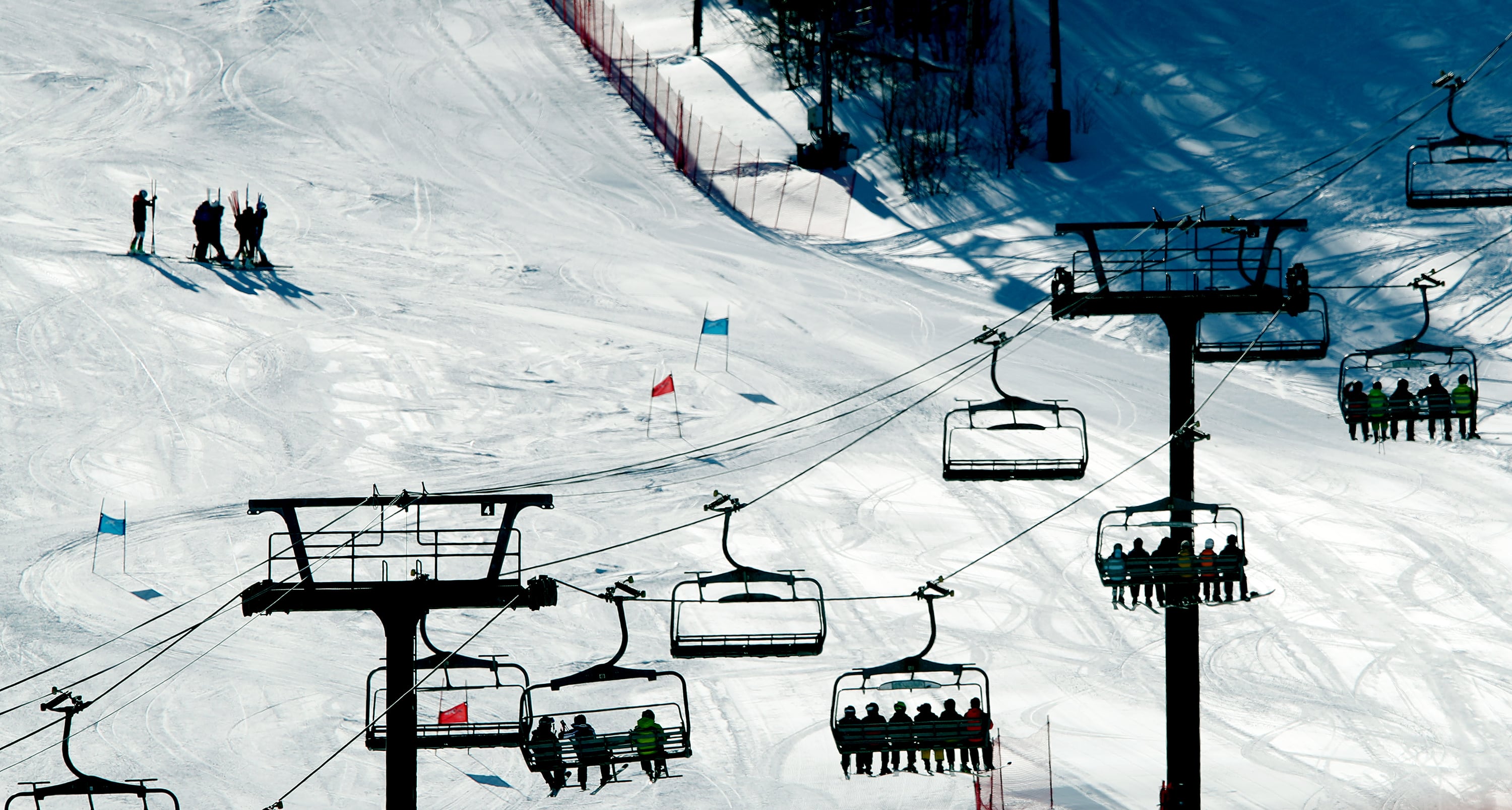 Skiers and snowboarders ride lifts up the mountain at Park City Mountain Resort on Jan. 11, 2022. The resort is gearing up for a "Super El Nino" this winter.