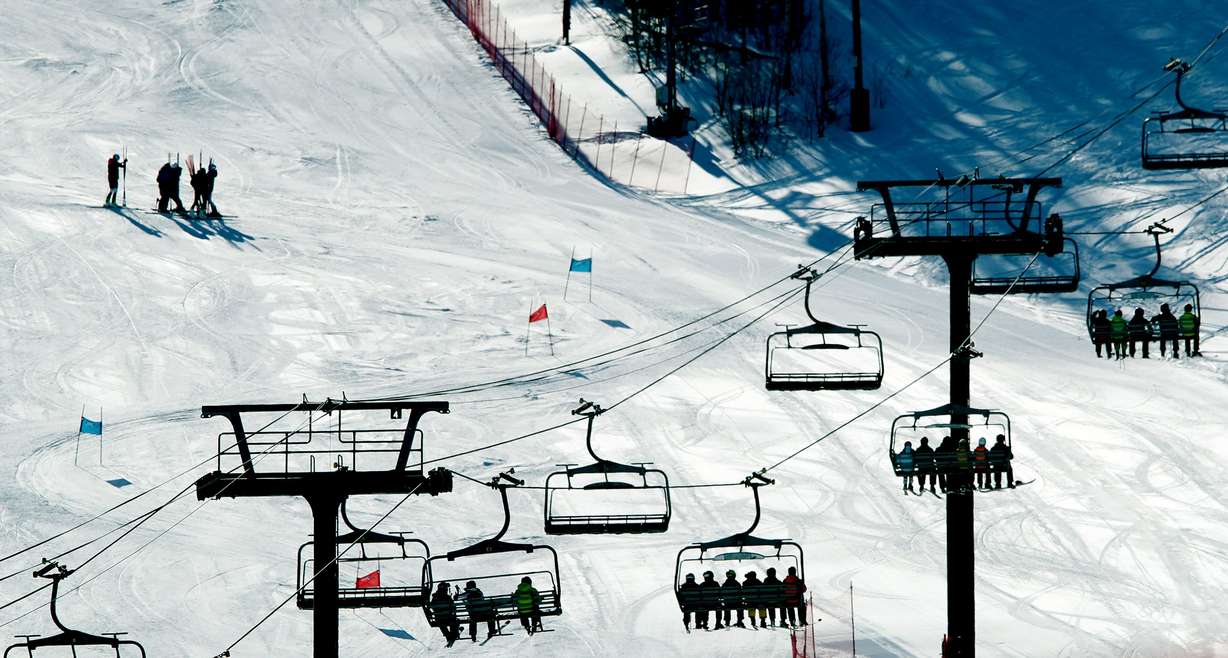 Skiers and snowboarders ride lifts up the mountain at Park City Mountain Resort on Jan. 11, 2022. The resort is gearing up for a "Super El Nino" this winter.