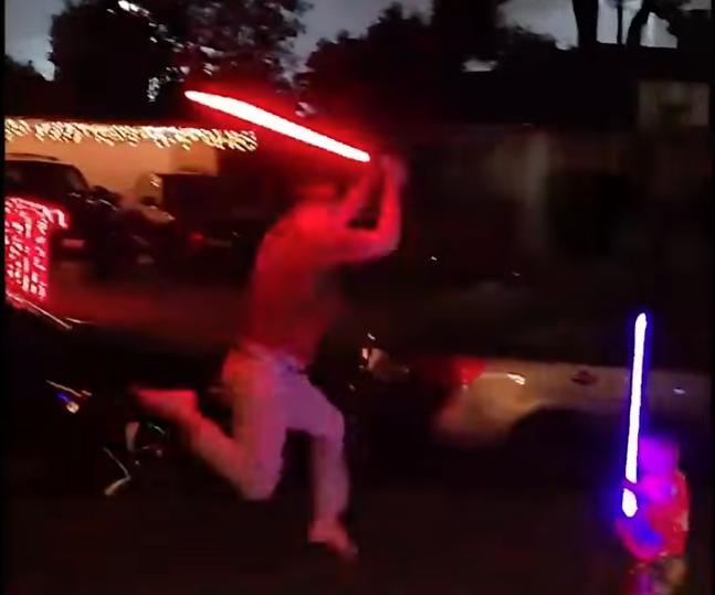Have You Seen This? Overzealous dad 'wins' lightsaber battle