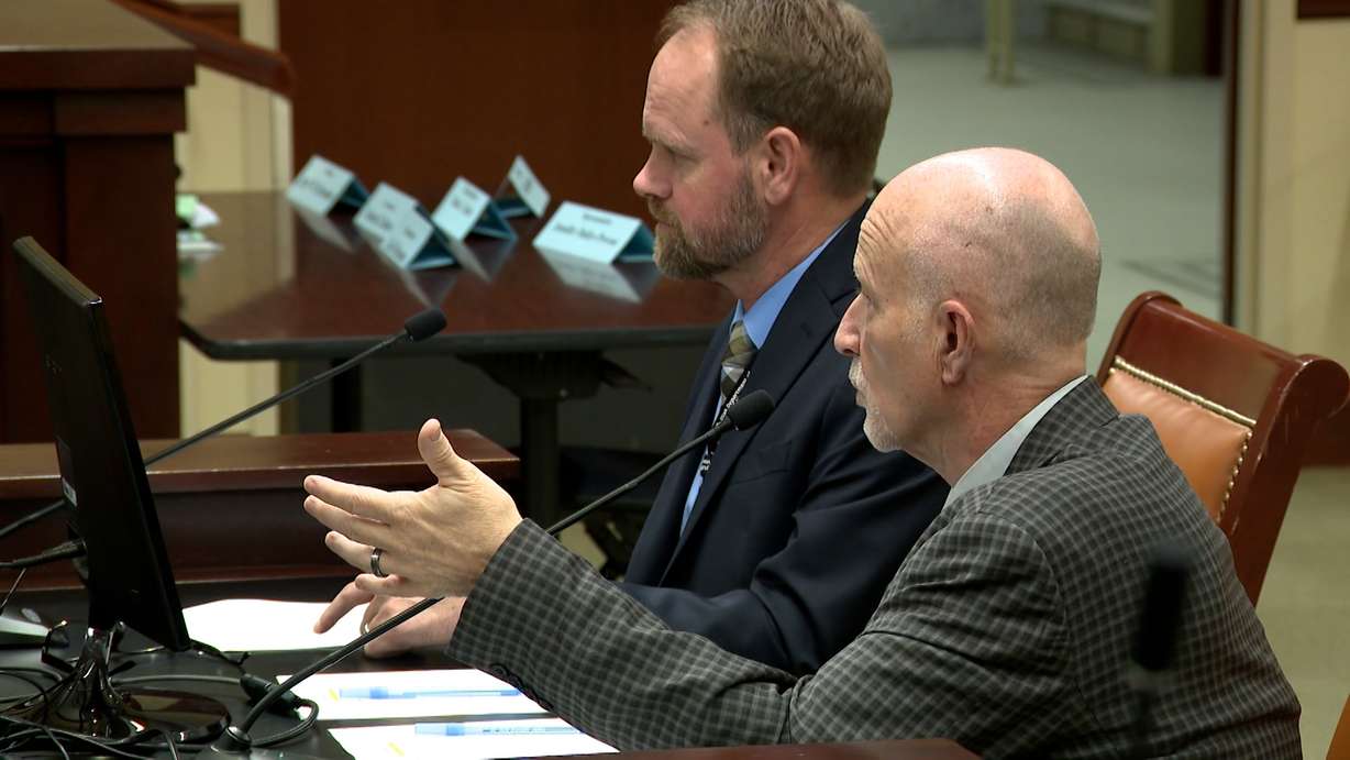 Utah State Hospital assistant superintendent Jeremy Christensen, left, and superintendent Dallas Earnshaw, right, speak to members of the Health and Human Services Interim Committee on Wednesday.