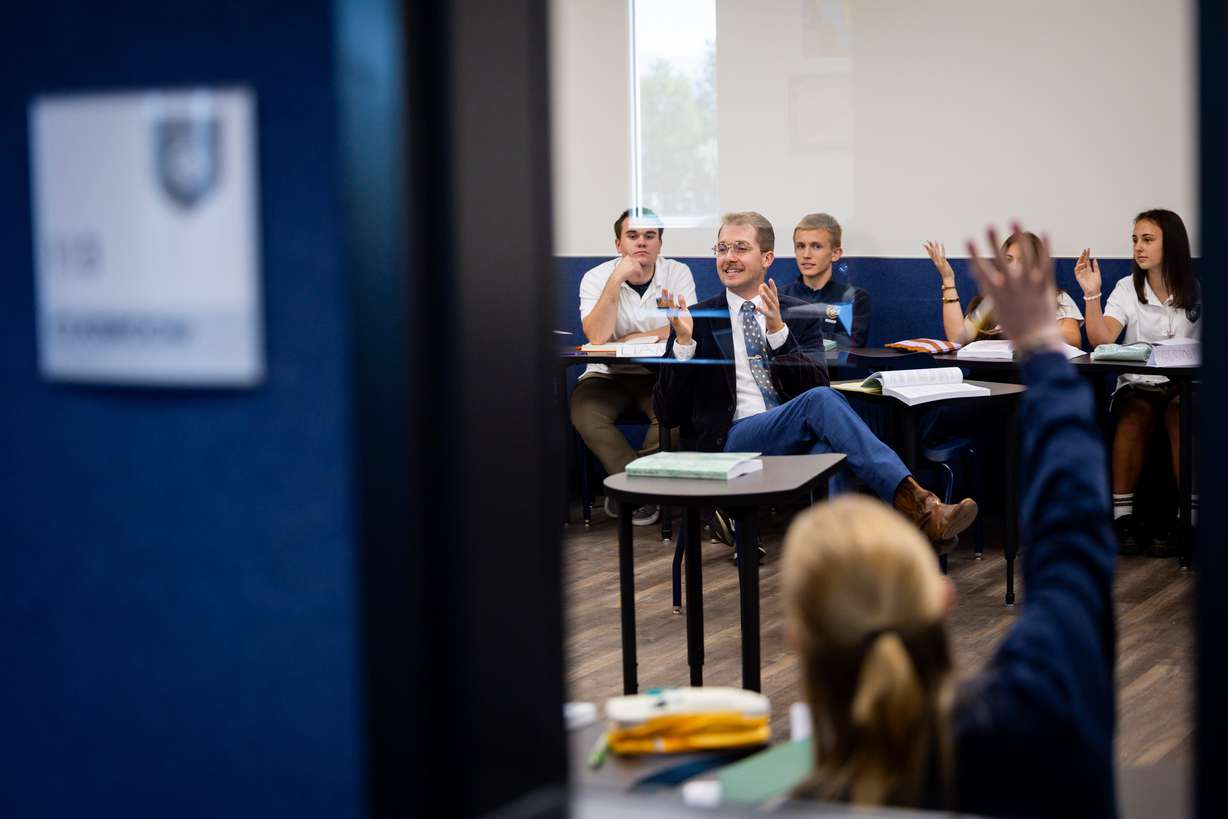 Nicholas Martin, center, teaches a 11th grade Socratic U.S. history and English class at Karl Maeser Preparatory Academy in Lindon on Wednesday. Karl Maeser Preparatory Academy was selected as Utah's top high school.