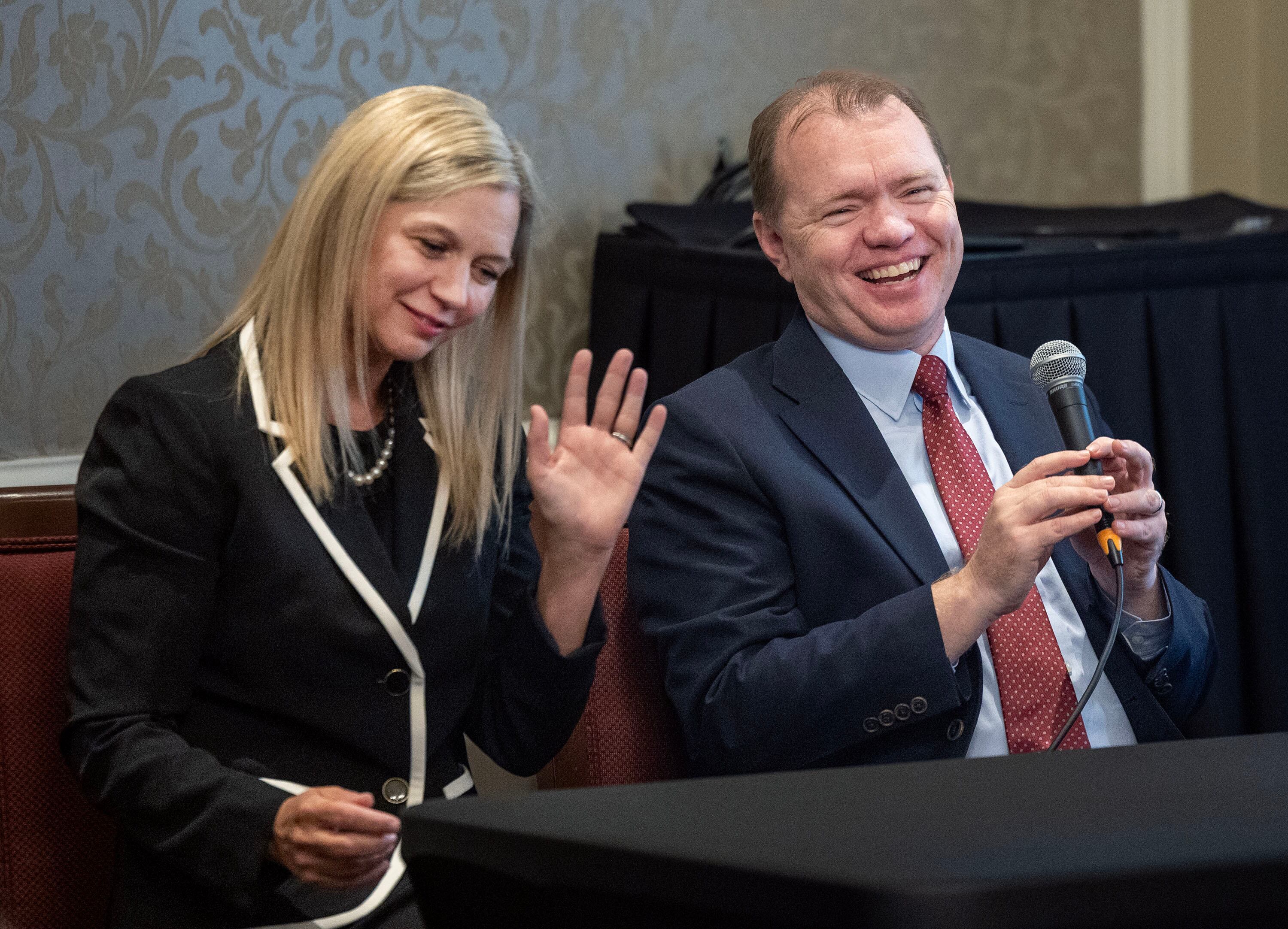 U.S. Attorney and former FTC Commissioner Melissa Holyoak and Aaron Nielson laugh while speaking at the Alta Club in Salt Lake City on Wednesday. Holyoak and Nielson spoke about the future of the FTC and the risks of expanding presidential powers.
