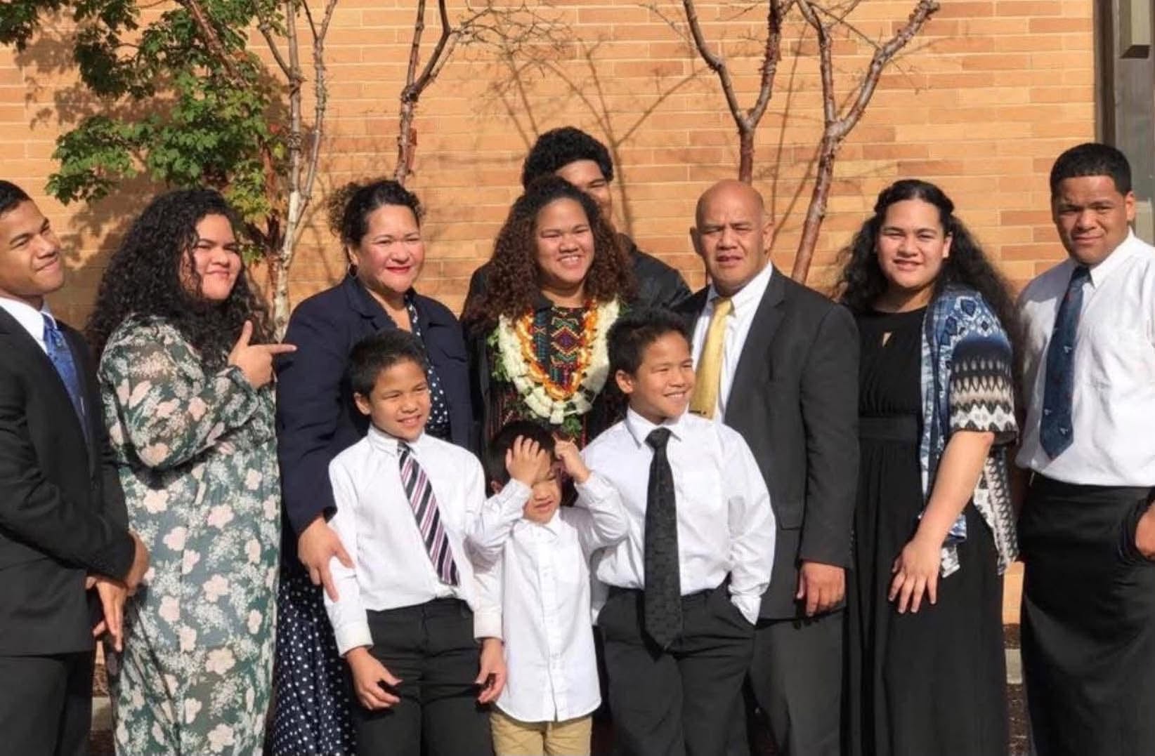 The Angilau family is pictured.