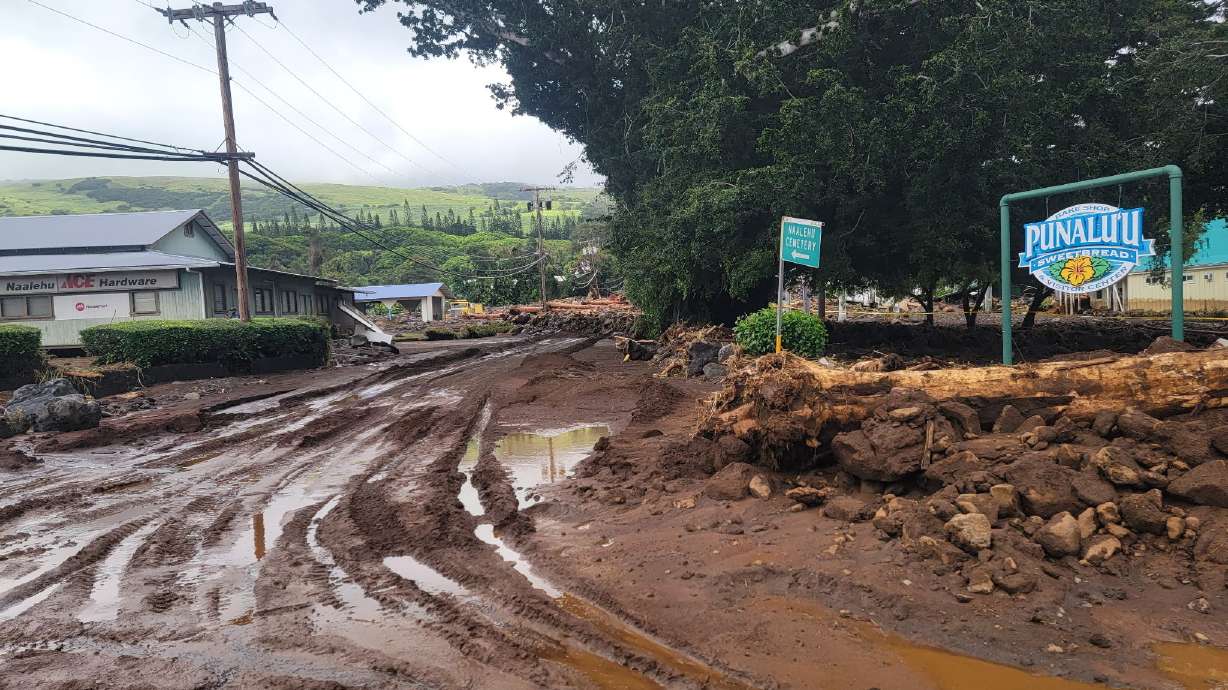 A roadway is washed out by mud on Monday in Naalehu, Hawaii, following heavy rains from Hurricane Lala. The state is bracing for possibly another tropical cyclone this weekend.