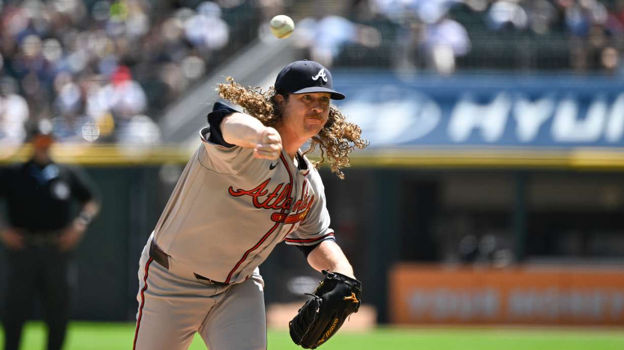 Atlanta Braves pitcher Grant Holmes delivers during the first inning of a baseball game against the Chicago White Sox, Thursday, Aug. 20, 2026, in Chicago.