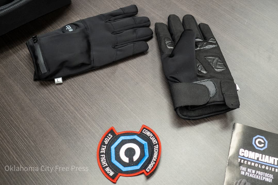 The G.L.O.V.E., developed by Compliant Technologies LLC, sits on a table after a demonstration at the Oklahoma County Detention Center in Oklahoma City, March 22, 2023.