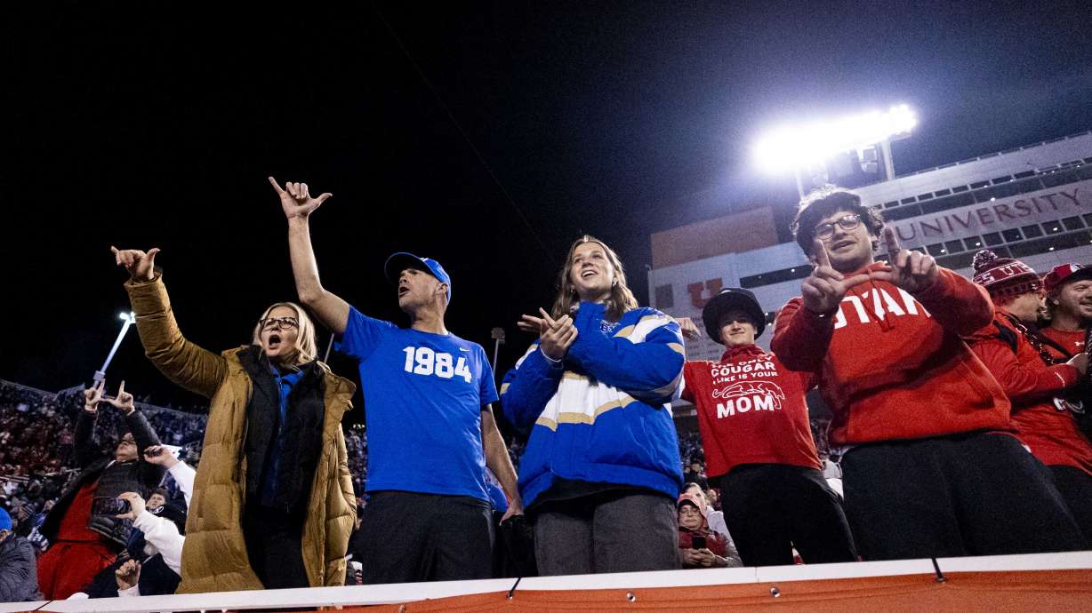 BYU and Utah Utes fans cheer before a game between the University of Utah Utes and the Brigham Young University Cougars held at Rice-Eccles Stadium in Salt Lake City on Saturday, Nov. 9, 2024.
