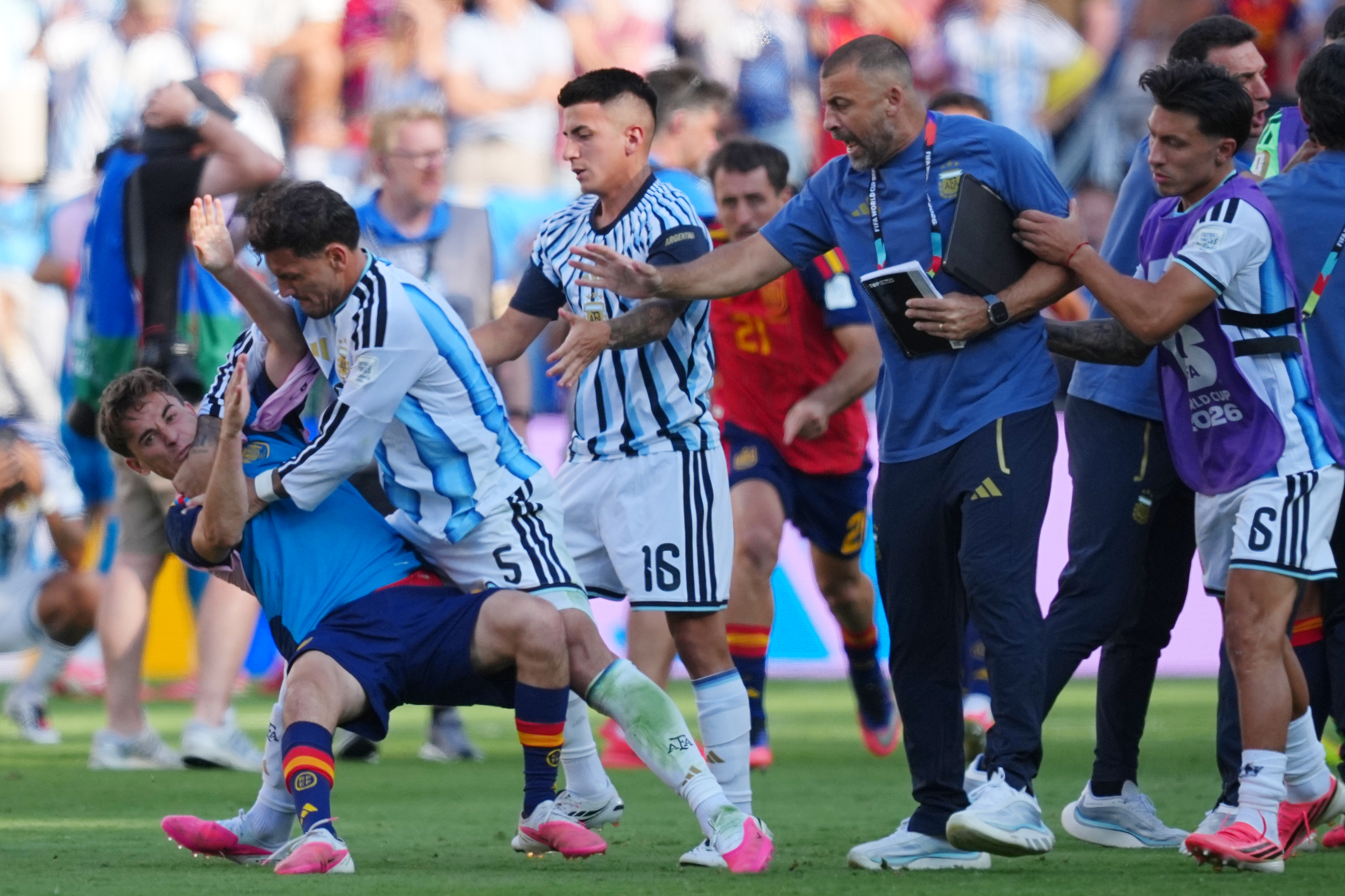 FILE - Argentina's Leandro Paredes (5) knocks down Spain's Gavi (9) during scuffle after the World Cup final soccer match between Spain and Argentina in East Rutherford, N.J., near New York, Sunday, July 19, 2026. 