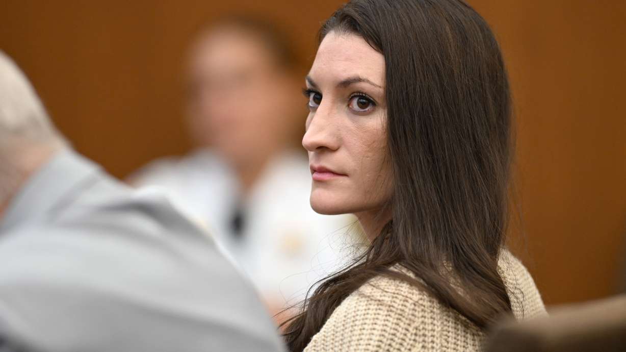 Lindsay Clancy, looks toward reporters in the courtroom during proceedings in her murder trial on Thursday in Plymouth, Mass.