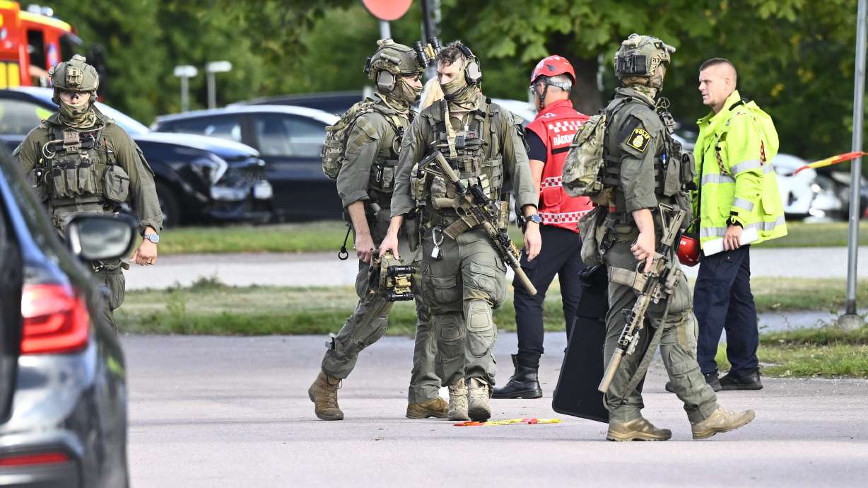 Police and emergency personnel outside Brinellskolan during a major emergency response after a man with a sword reportedly injured several people at the school in Fagersta, Sweden, Friday.