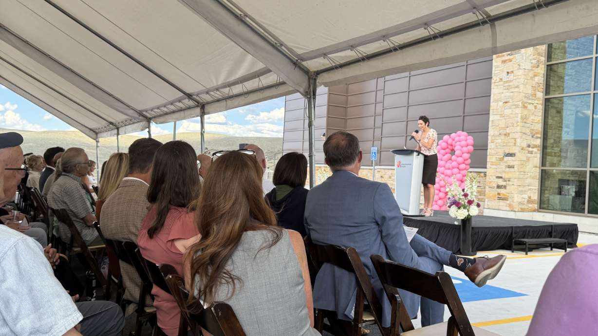 Dani Kurtz, an Intermountain Health employee and cancer patient, speaks about her experience ahead of a ribbon cutting for the cancer center at the Park City Hospital on Thursday.