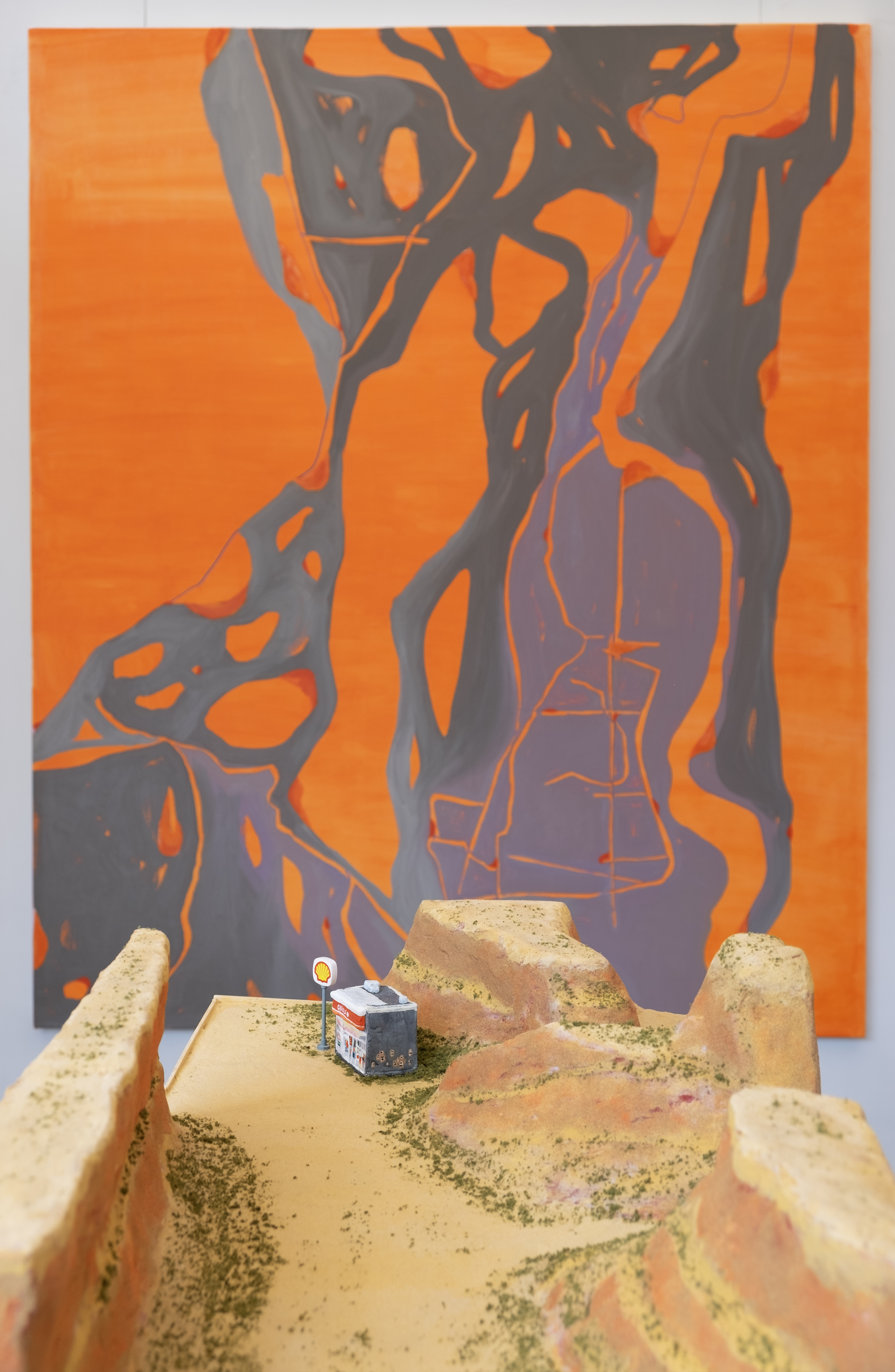 Artworks by Ron Rosario and Eve Everett are on display as part of the "Rest Stop" art show at Will's Canyon Stop in Orem.