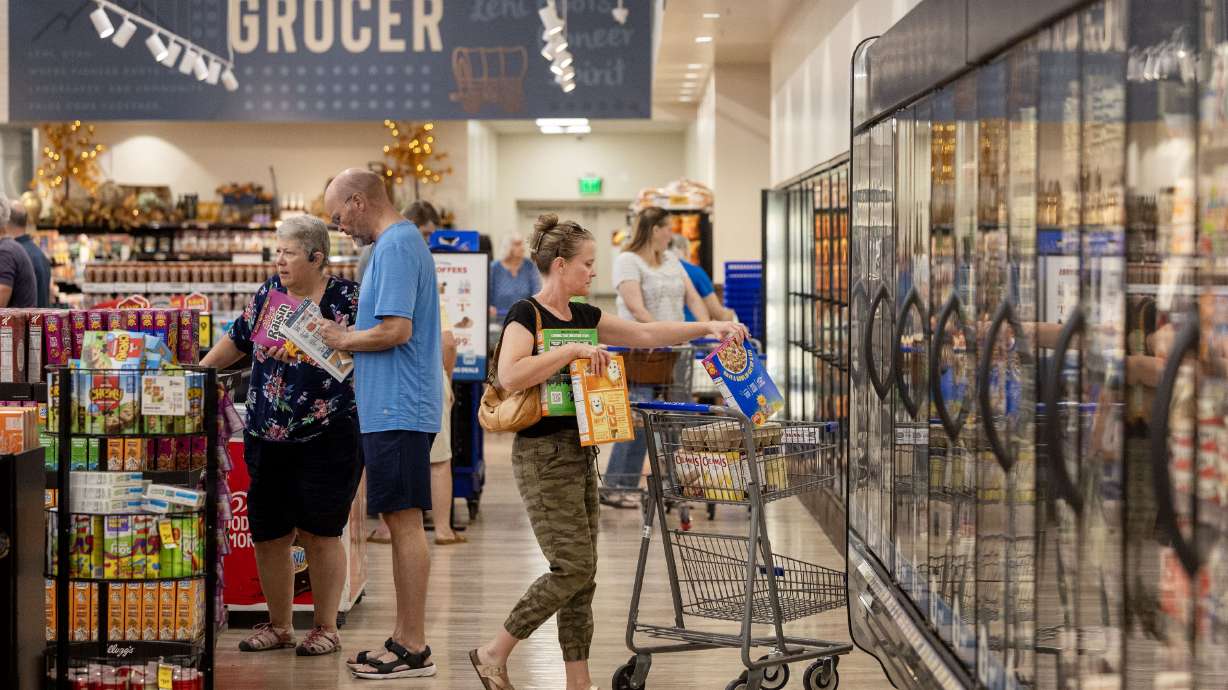 Customers shop at Macey's during its grand reopening in Lehi on Wednesday. By and large, Utah's economy has remained steady throughout the summer and recent survey results signal increased consumer optimism may be on the horizon.