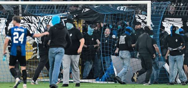 German Cup match marred by fireworks, pitch invasion