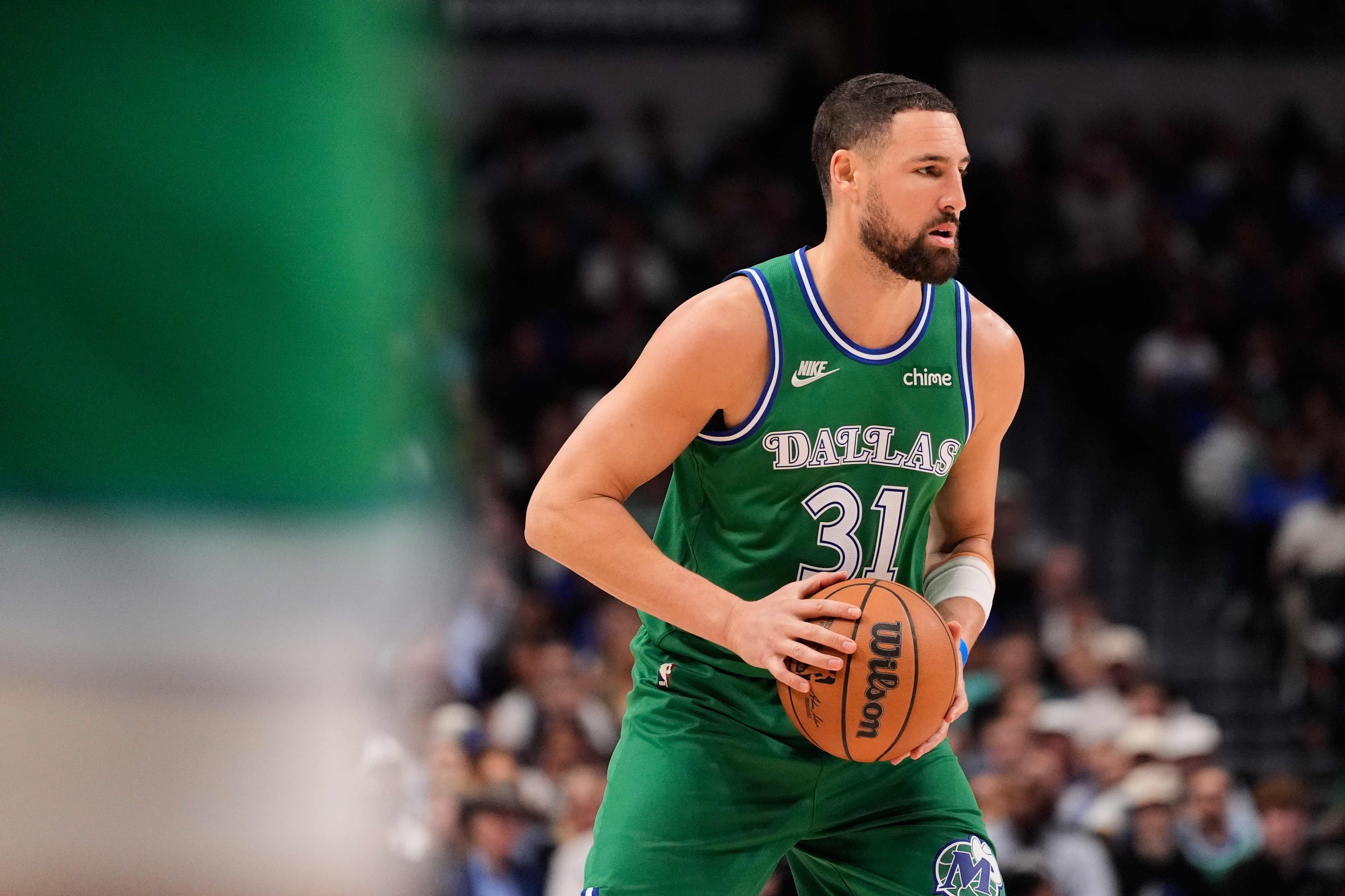 FILE - Dallas Mavericks guard Klay Thompson handles the ball during an NBA basketball game against the Atlanta Hawks in Dallas, March 18, 2026. 