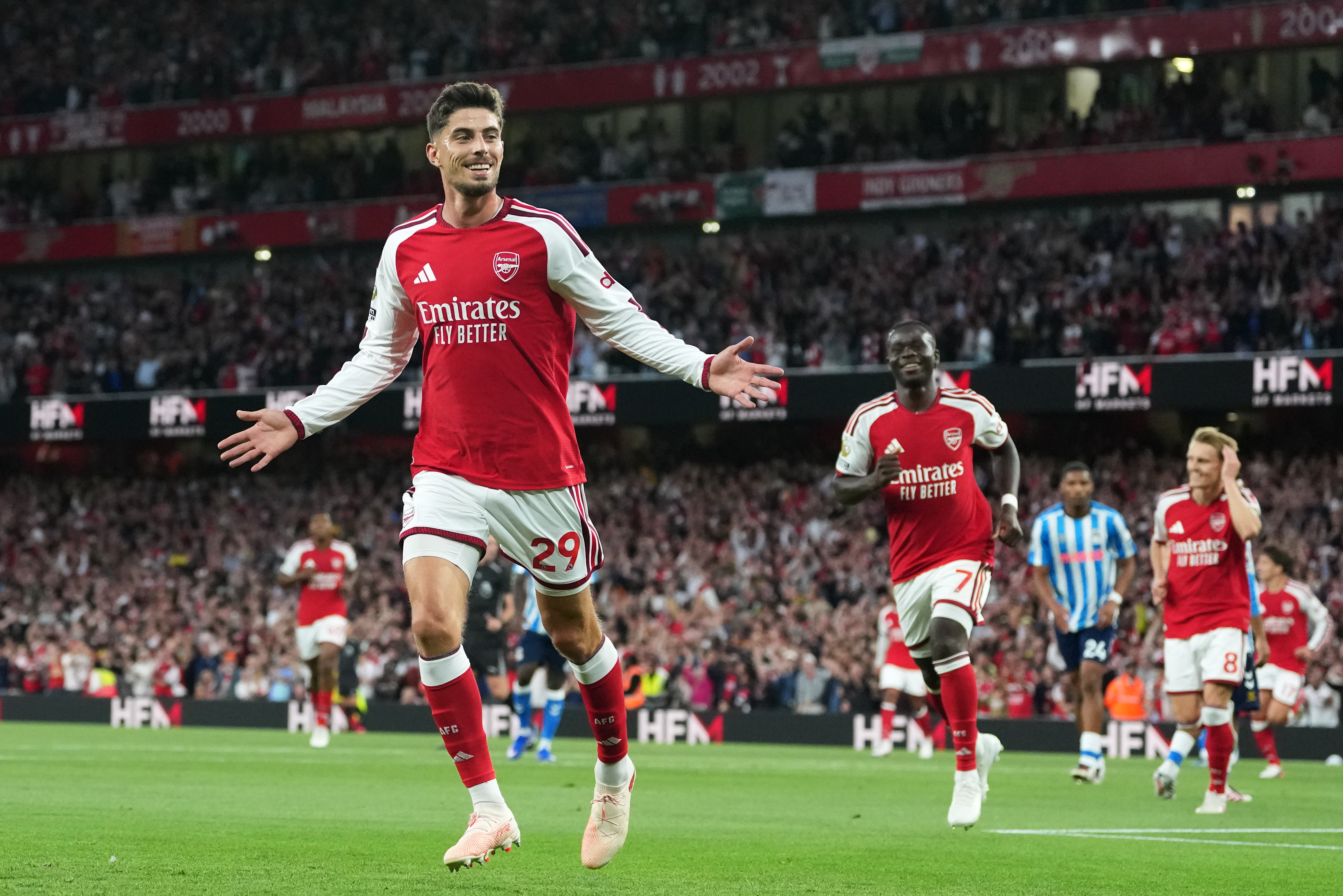 Tzolis shines as Arsenal opens Premier League season by sweeping aside promoted Coventry