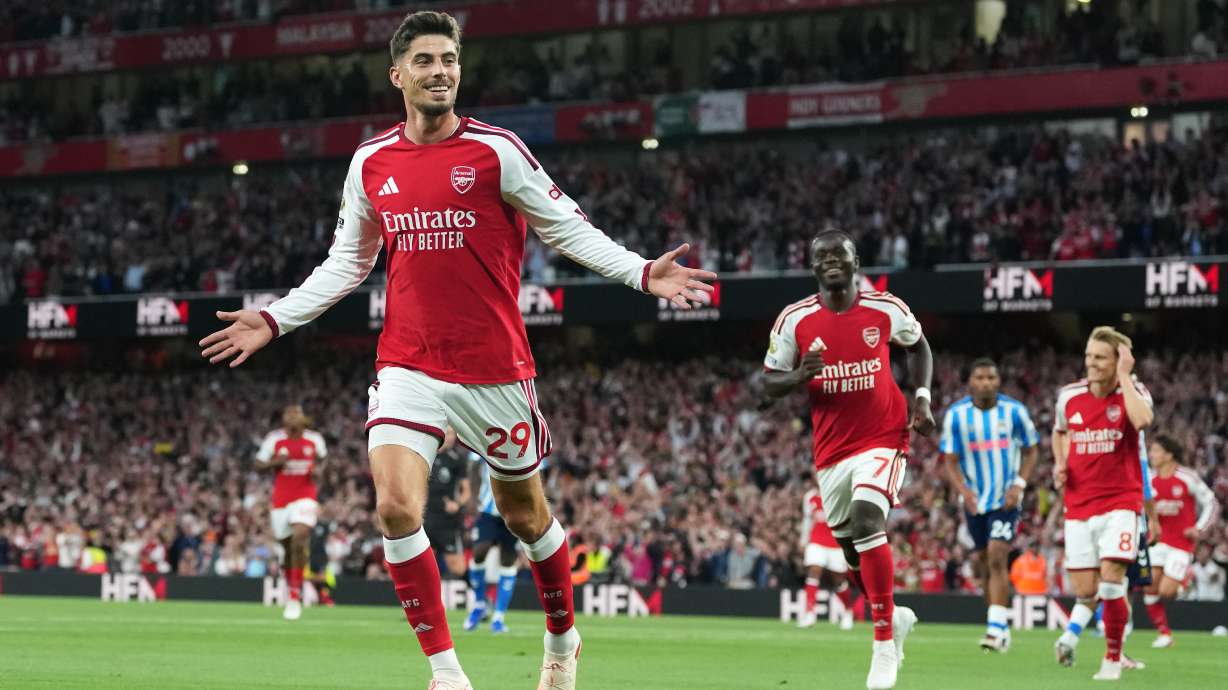 Arsenal's Kai Havertz celebrates after scoring the opening goal during the English Premier League soccer match between Arsenal and Coventry City in London, Friday, Aug. 21, 2026.
