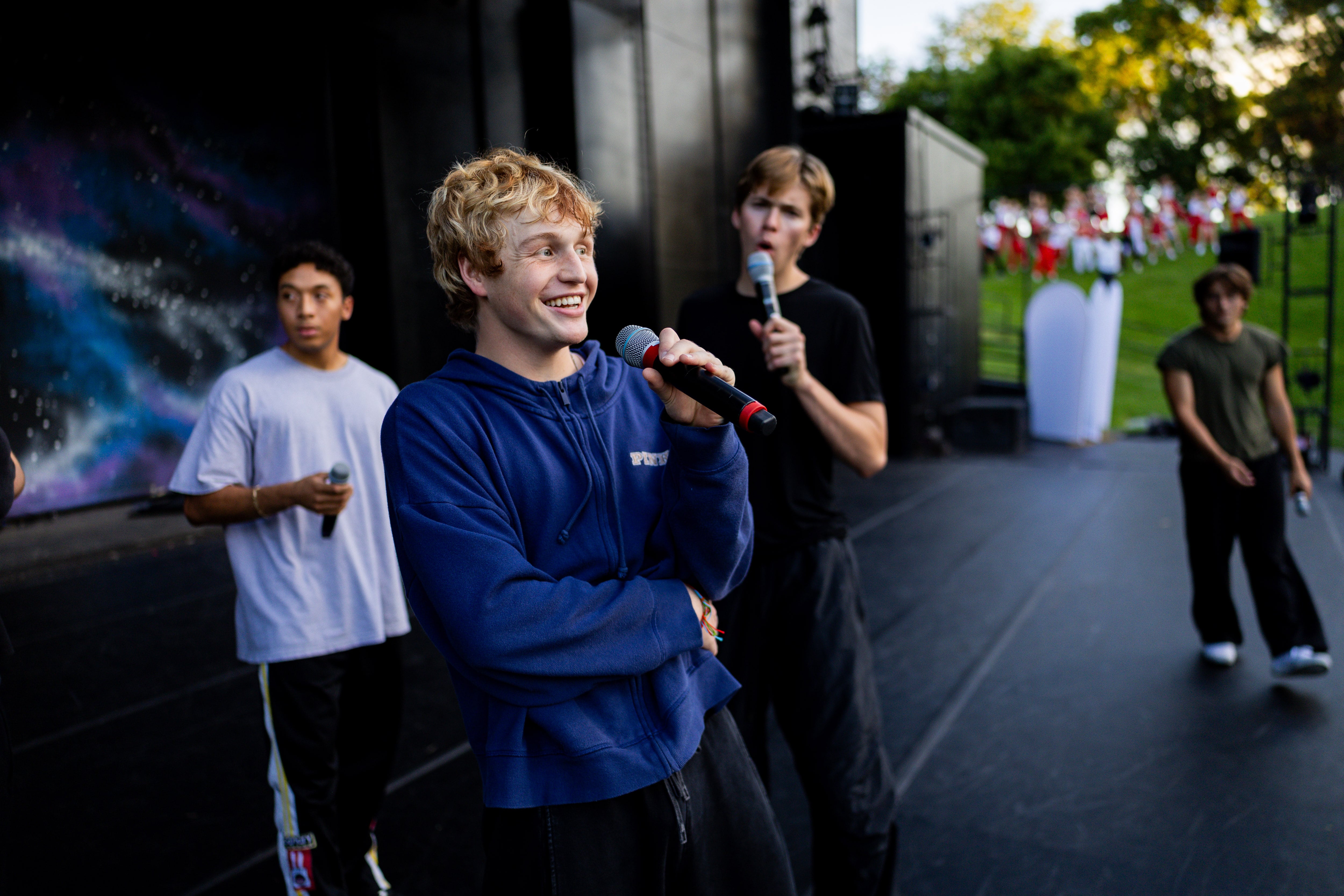 Dossan Bell, from Utah, center, and other members of the Full Circle Boys rehearse for the 21st annual "Dancing Under the Stars" at the SCERA Shell Outdoor Theatre  in Orem on Thursday.