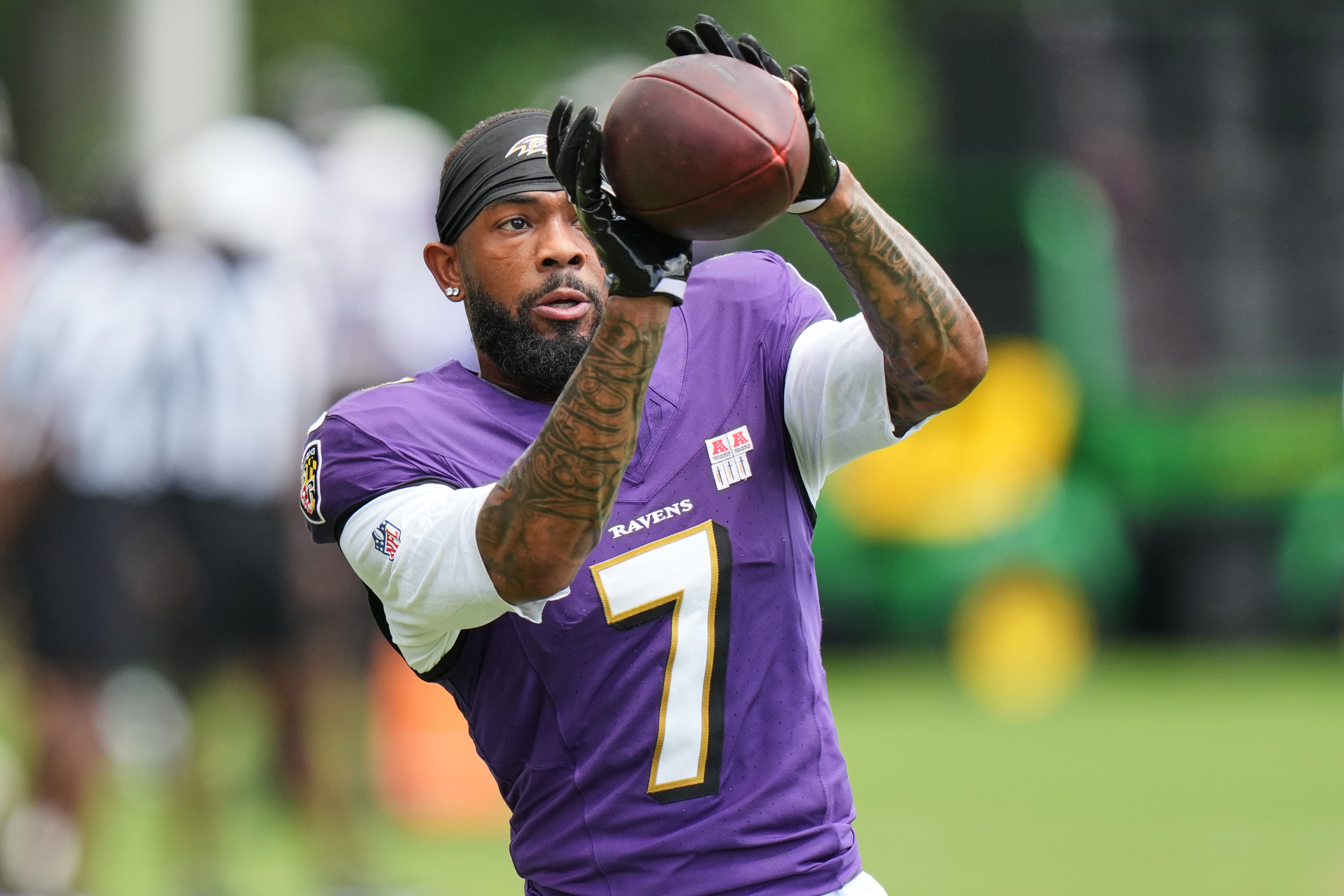 FILE - Baltimore Ravens wide receiver Rashod Bateman (7) works out during the team's NFL football training camp, Monday, Aug. 17, 2026, at the Under Armour Performance Center in Owings Mills, Md. 