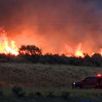 Grass fire in Garland prompts evacuation, temporary I-15 closure