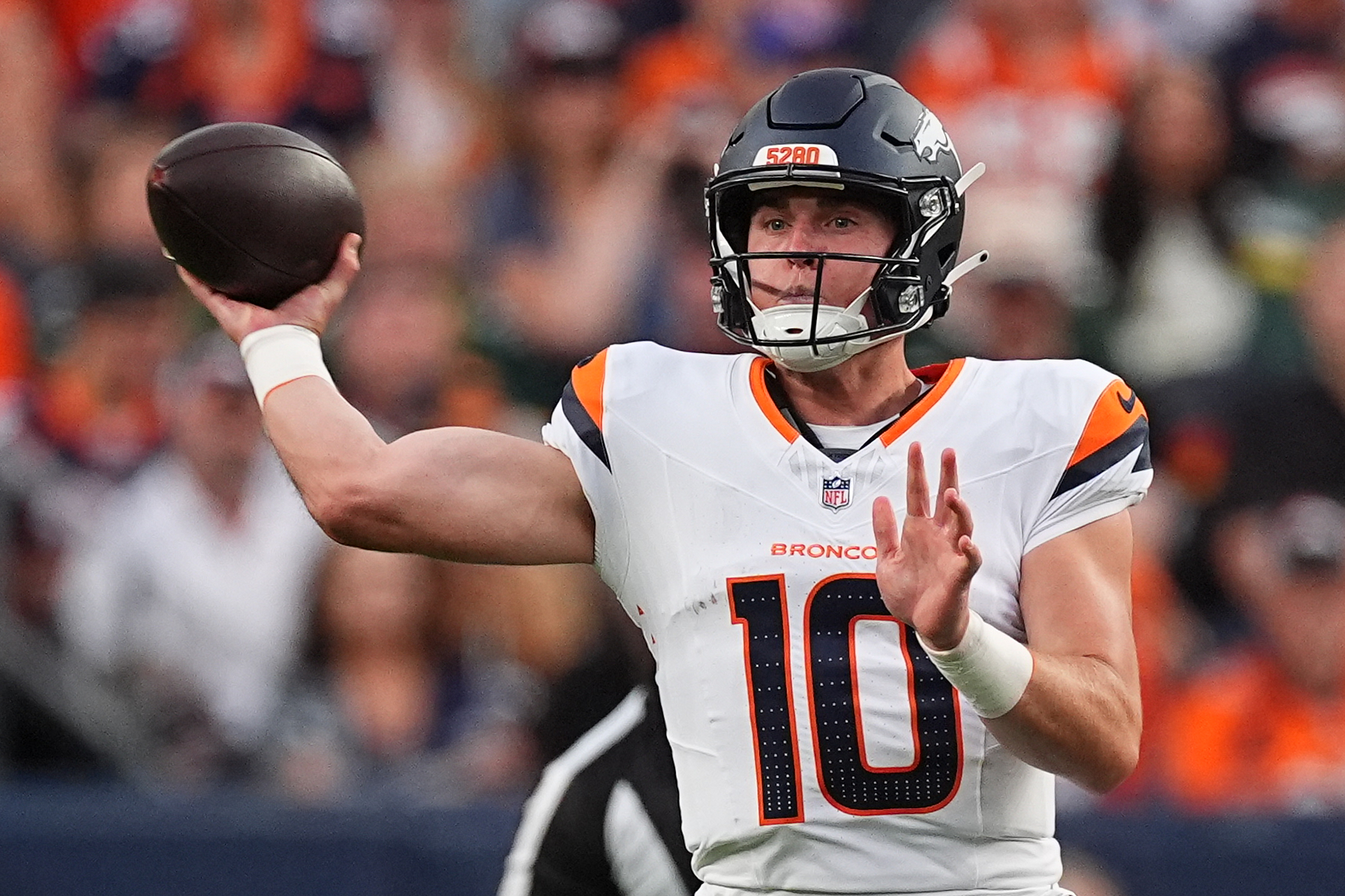 Denver Broncos quarterback Bo Nix (10) throws against the Green Bay Packers during the first half of an NFL preseason football game Friday, Aug. 21, 2026, in Denver. 