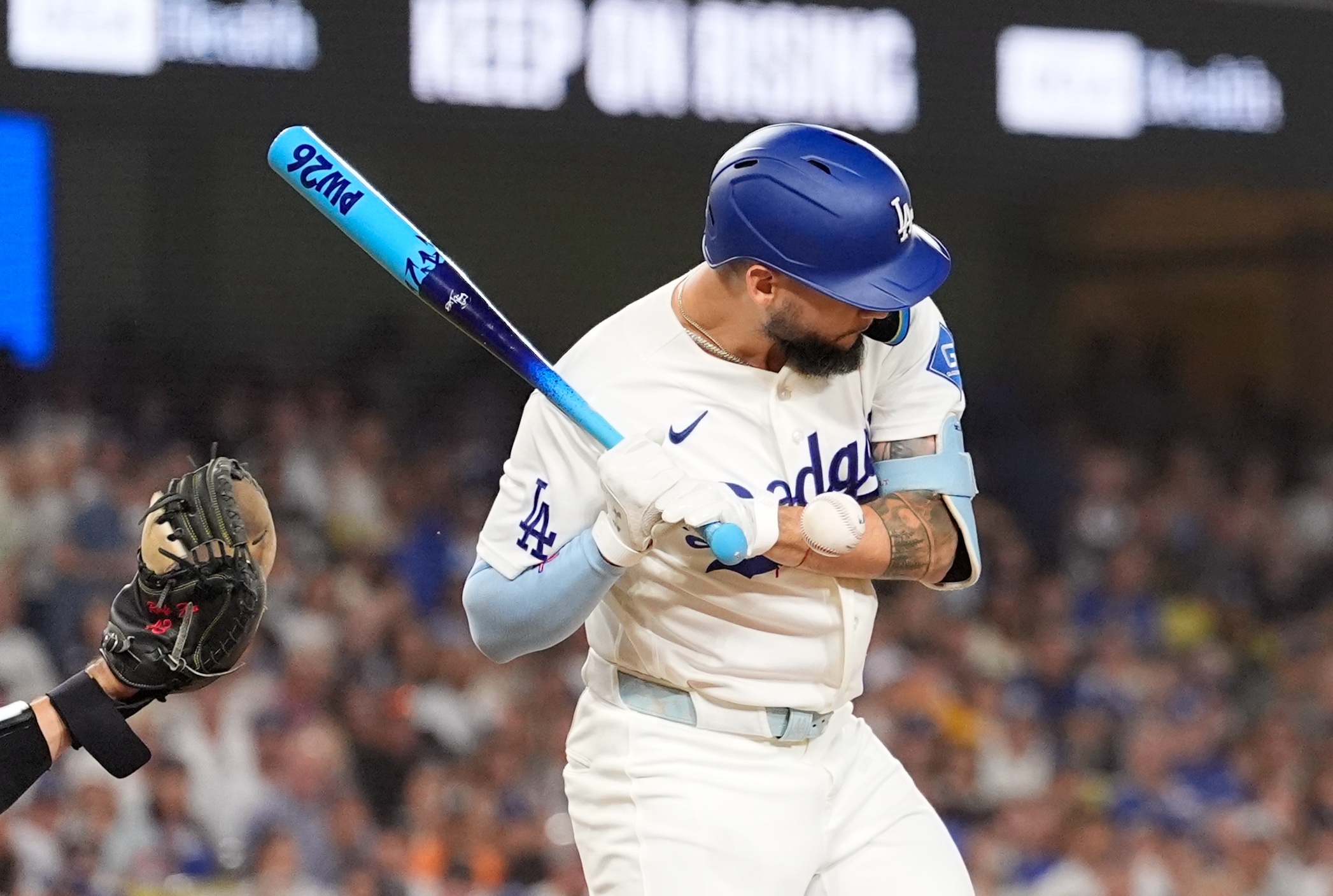 Los Angeles Dodgers' Andy Pages is hit in the hand by a pitch during the third inning of a baseball game against the Pittsburgh Pirates, Friday, Aug. 21, 2026, in Los Angeles. 