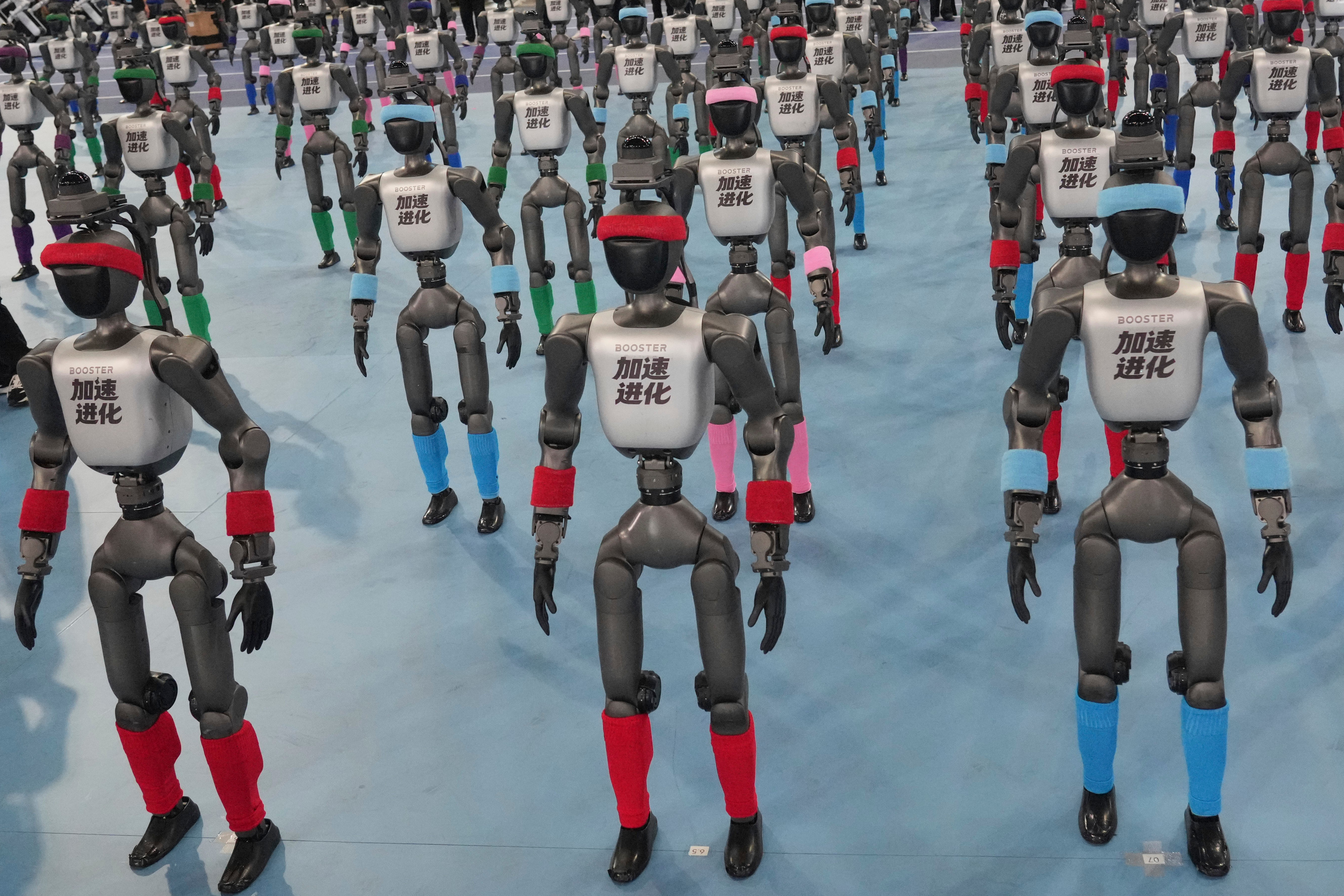 Robots are prepared ahead the opening ceremony of the World Humanoid Robot Games in Beijing, Saturday, Aug. 22, 2026. 
