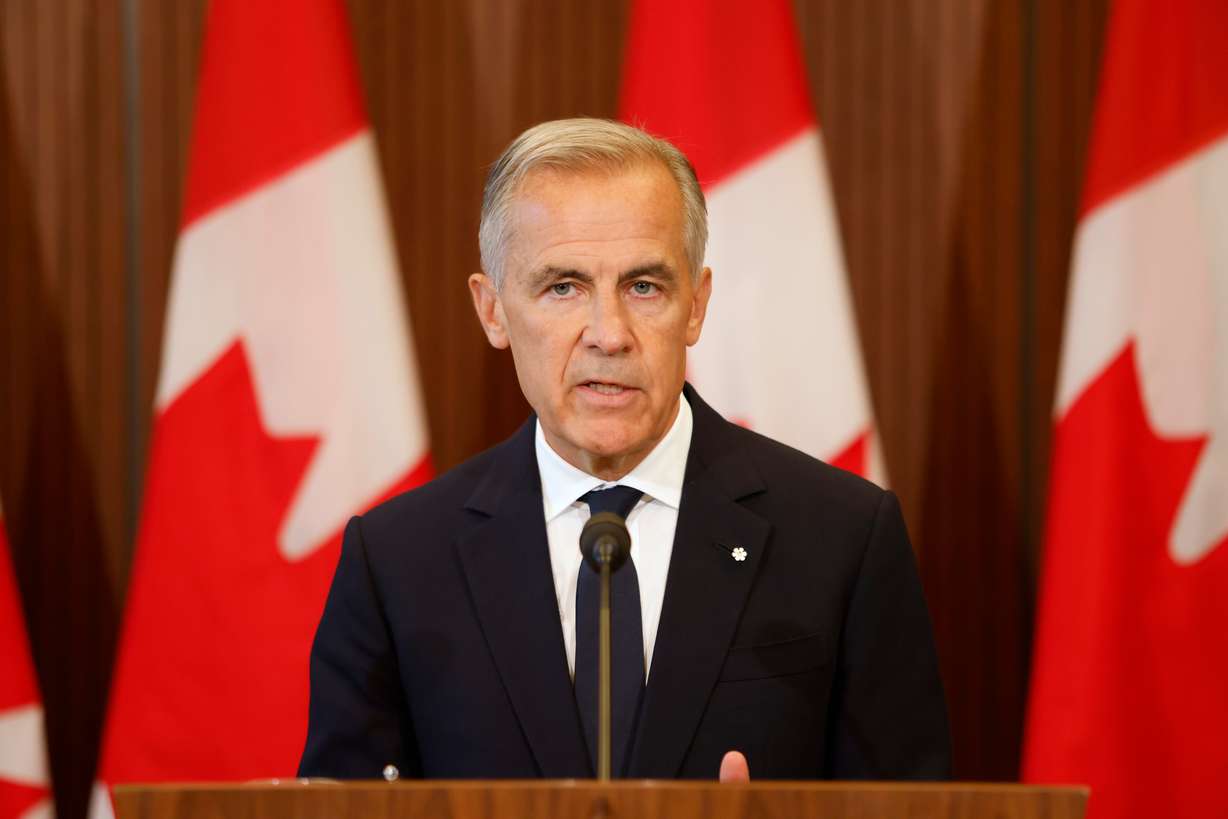 Prime Minister Mark Carney speaks about Canada's response to new U.S. tariffs during a news conference on Parliament Hill in Ottawa on Saturday.