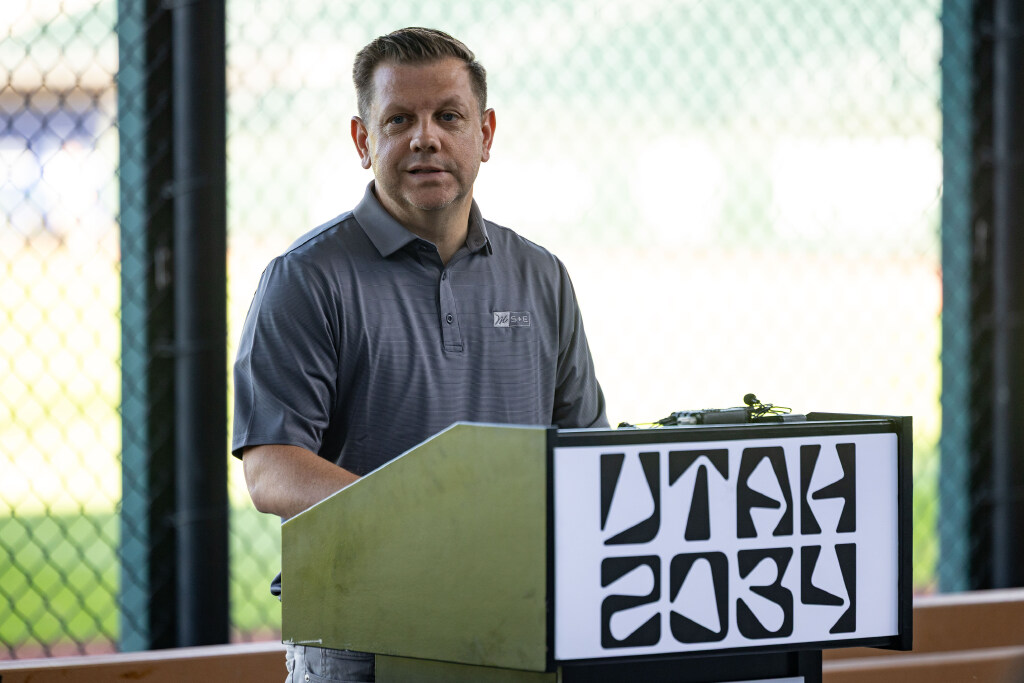 Steve Starks, the CEO of the Larry H. Miller Company and vice chair of Utah 2034, speaks during a presser held to announce the 2034 Olympic and Paralympic Winter Games Organizing Committee’s participation and financial support of Utah Sports Giving Day at the Ballpark at America First Square in South Jordan on Saturday.