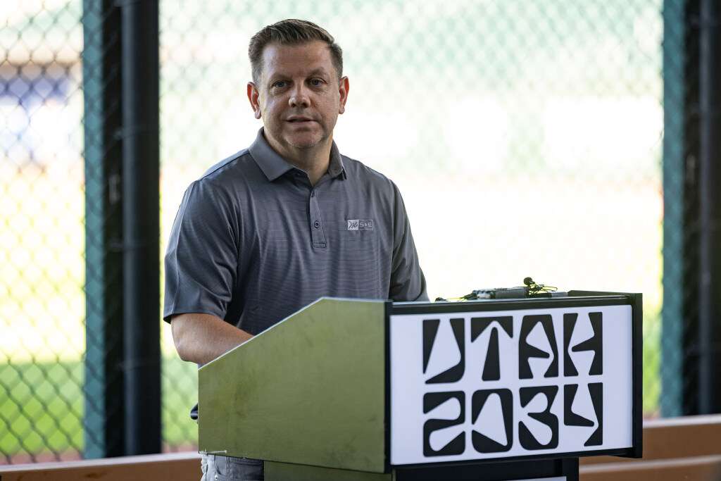 Steve Starks, the CEO of the Larry H. Miller Company and vice chair of Utah 2034, speaks during a presser held to announce the 2034 Olympic and Paralympic Winter Games Organizing Committee’s participation and financial support of Utah Sports Giving Day at the Ballpark at America First Square in South Jordan on Saturday.