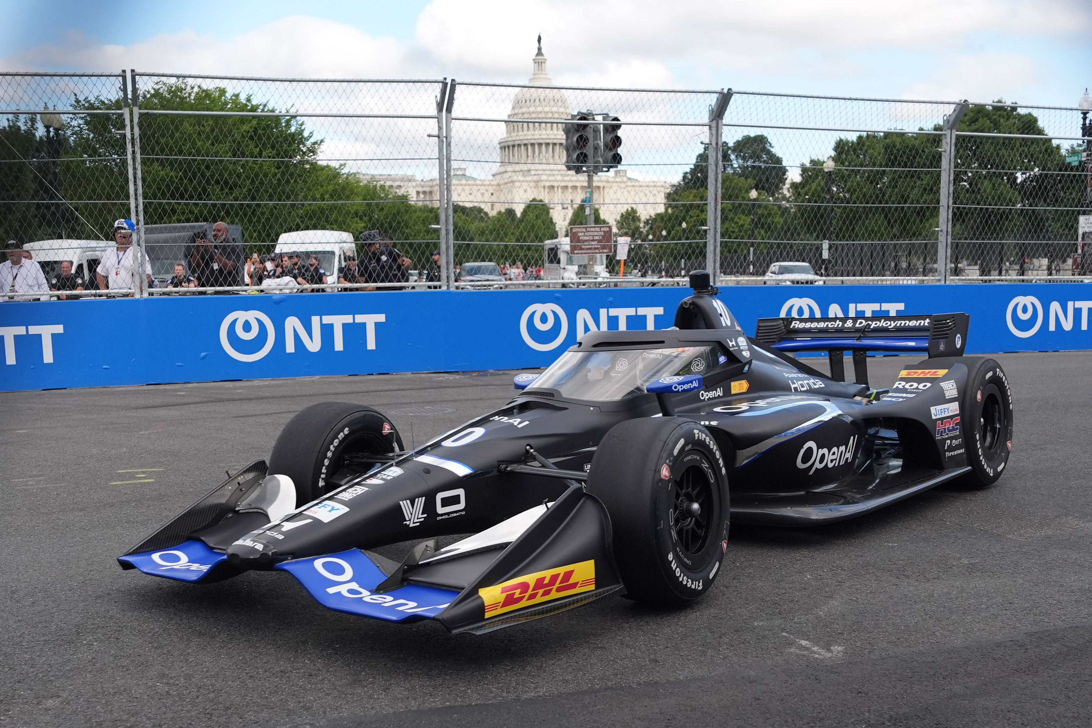 Race car diver Alex Palou, drives during a qualifying race prior to Sunday's Freedom 250 Grand Prix auto race in Washington, Saturday, Aug. 22, 2026.