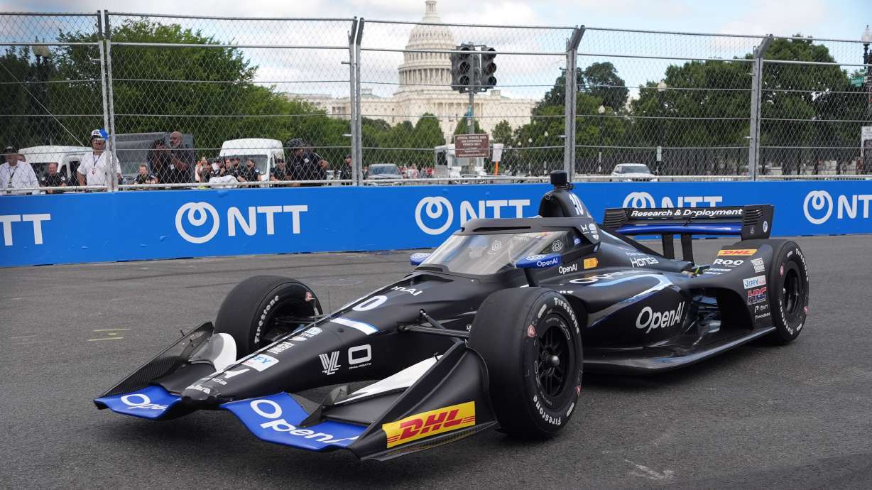 Race car diver Alex Palou, drives during a qualifying race prior to Sunday's Freedom 250 Grand Prix auto race in Washington, Saturday, Aug. 22, 2026.
