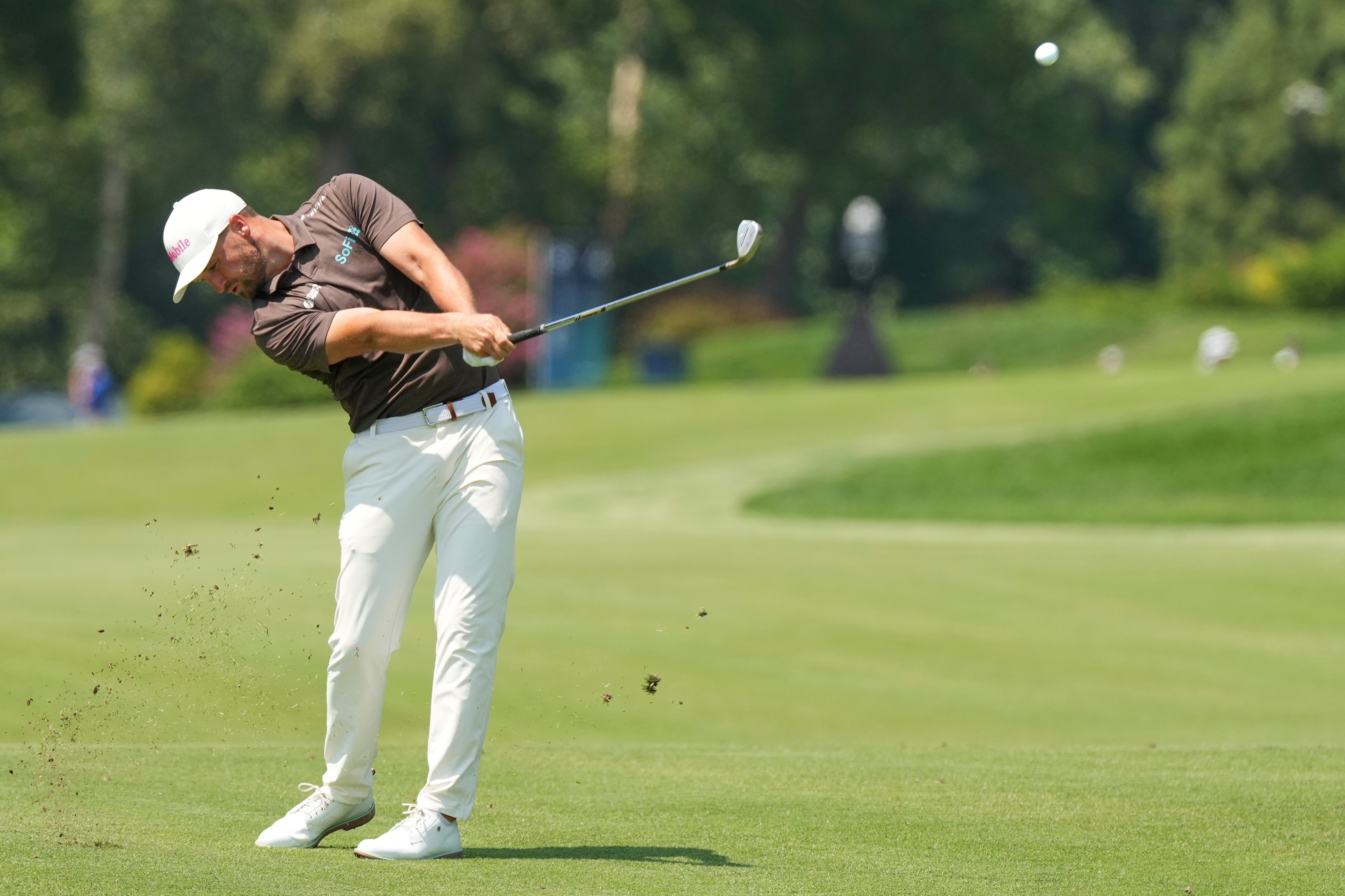 Wyndham Clark hits from the fourth fairway during the third round of the BMW Championship golf tournament Saturday, Aug. 22, 2026, in St. Louis. 