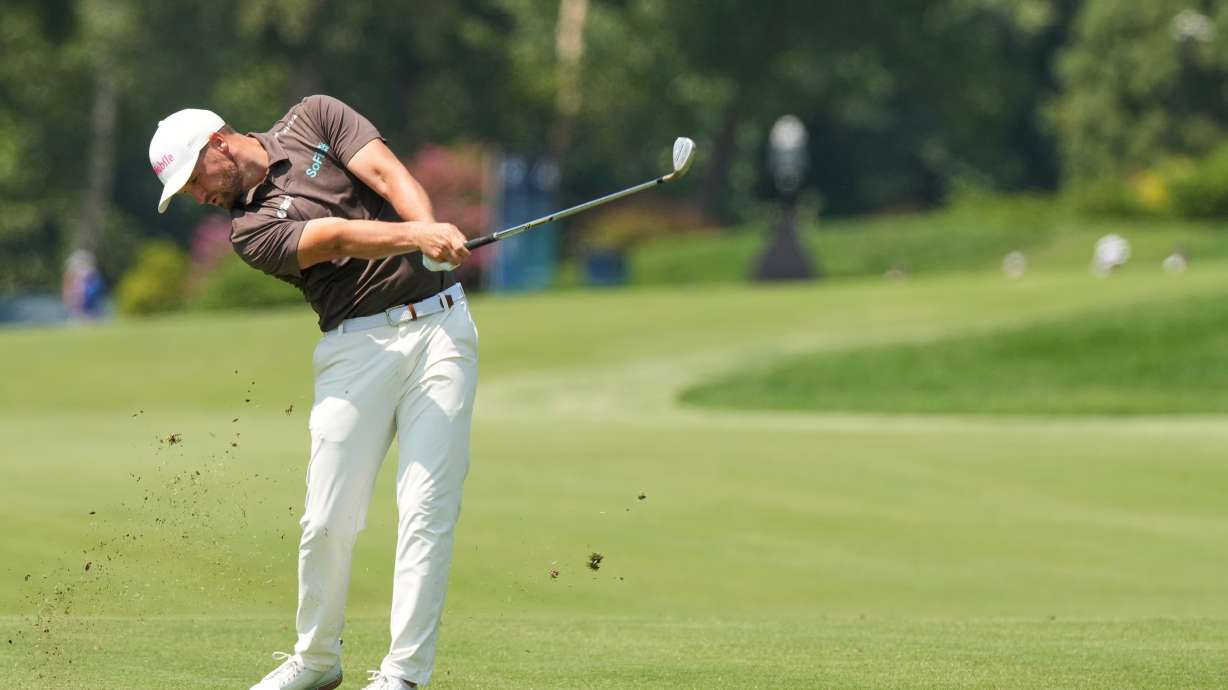 Wyndham Clark hits from the fourth fairway during the third round of the BMW Championship golf tournament Saturday, Aug. 22, 2026, in St. Louis.
