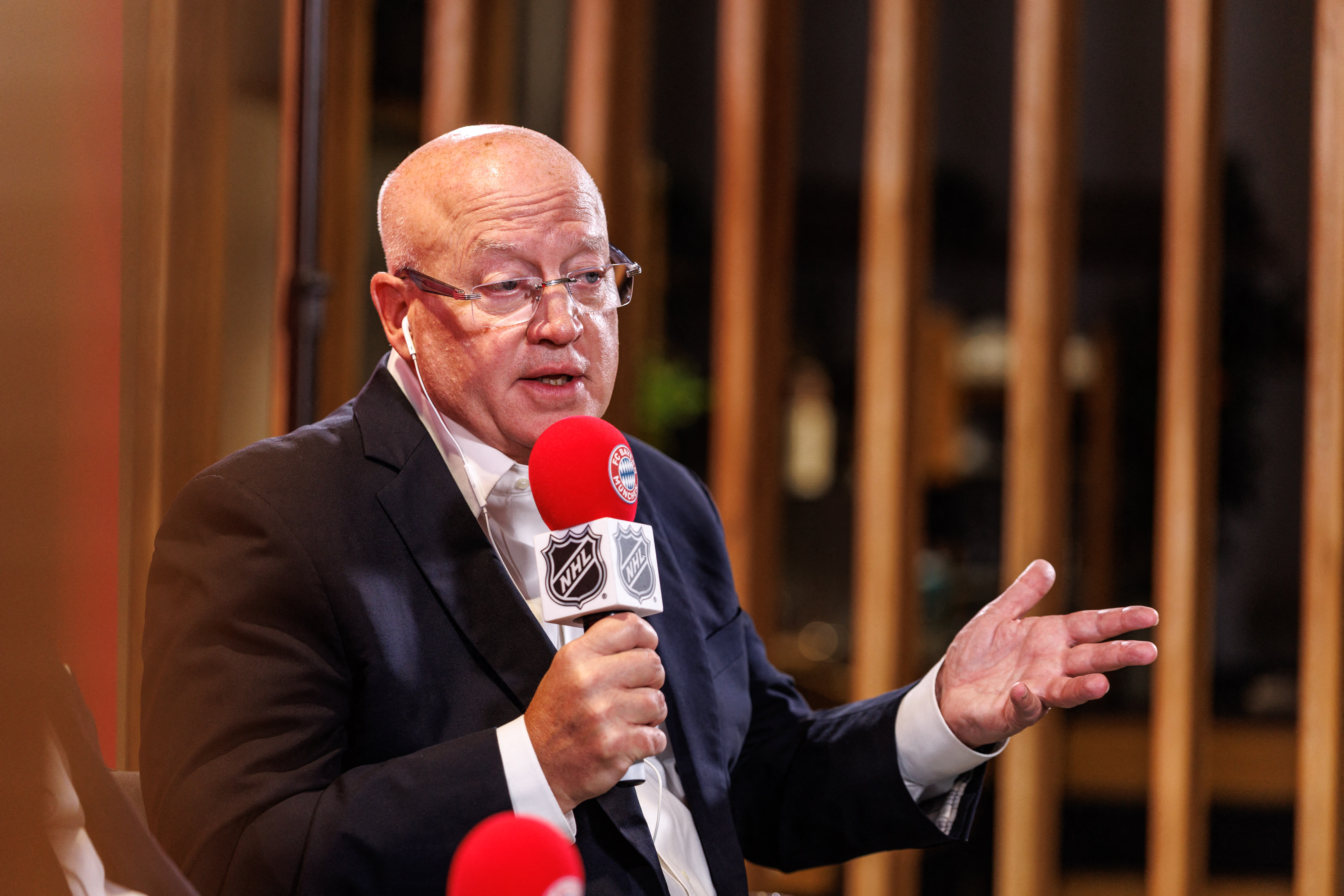 Bill Daly, deputy commissioner of the NHL, speaks during a joint press conference by FC Bayern Munich and the National Hockey League, Thursday, Aug. 20, 2026, in Munich. 