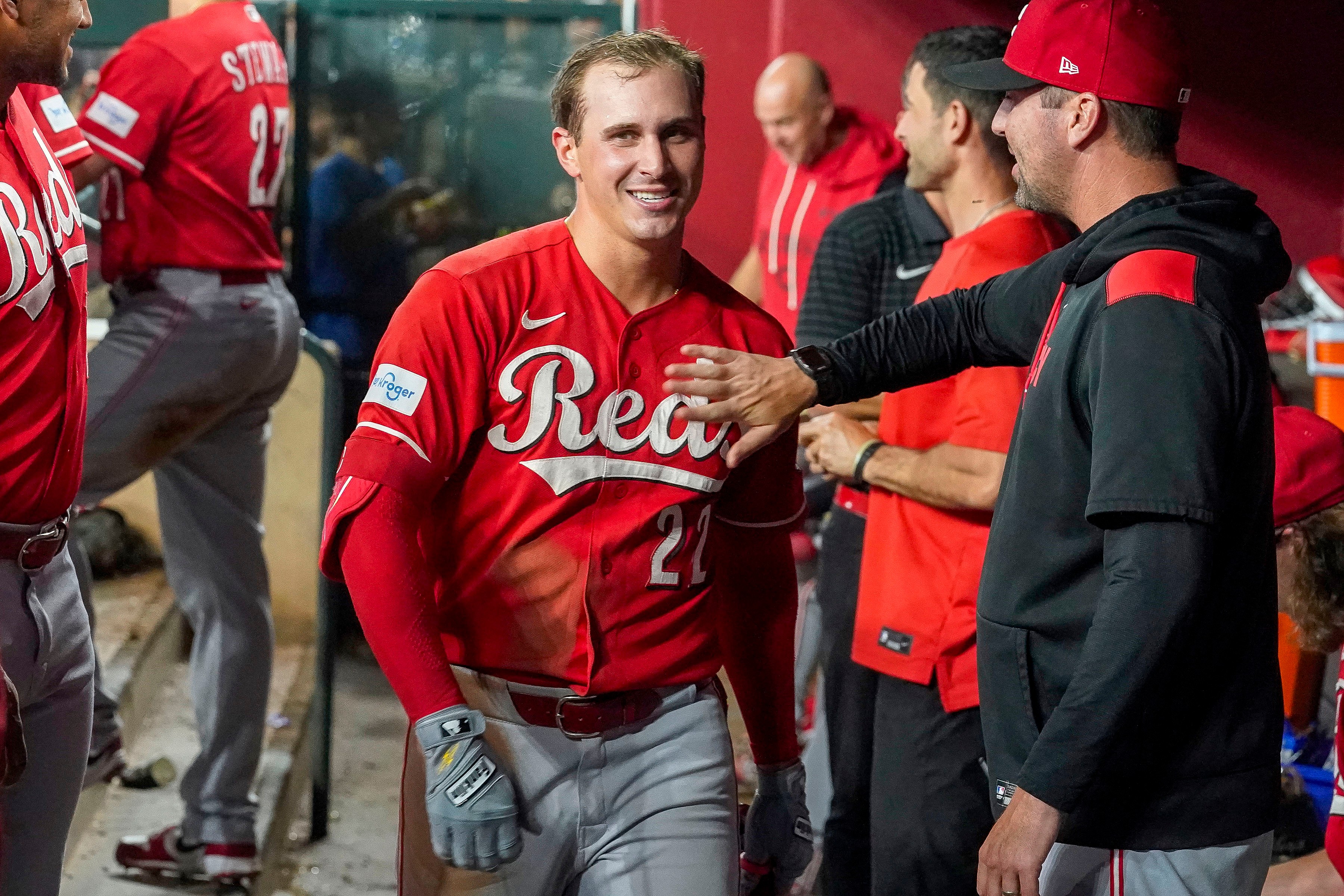 Cincinnati Reds' JJ Bleday, is all smiles after hitting a home run to complete hitting for the cycle during the sixth inning of a baseball game against the Arizona Diamondbacks, Saturday, Aug. 22, 2026, in Phoenix. 