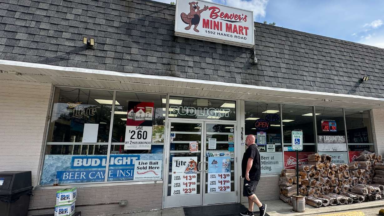 A customer walks into Beaver's Mini Mart in Beavercreek, Ohio, Aug. 14,.