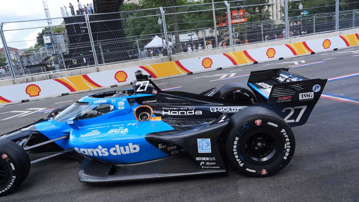 Kyle Kirkwood (27) makes a pit stop for gas during the IndyCar Freedom 250 Grand Prix auto race in Washington, Sunday, Aug. 23, 2026.