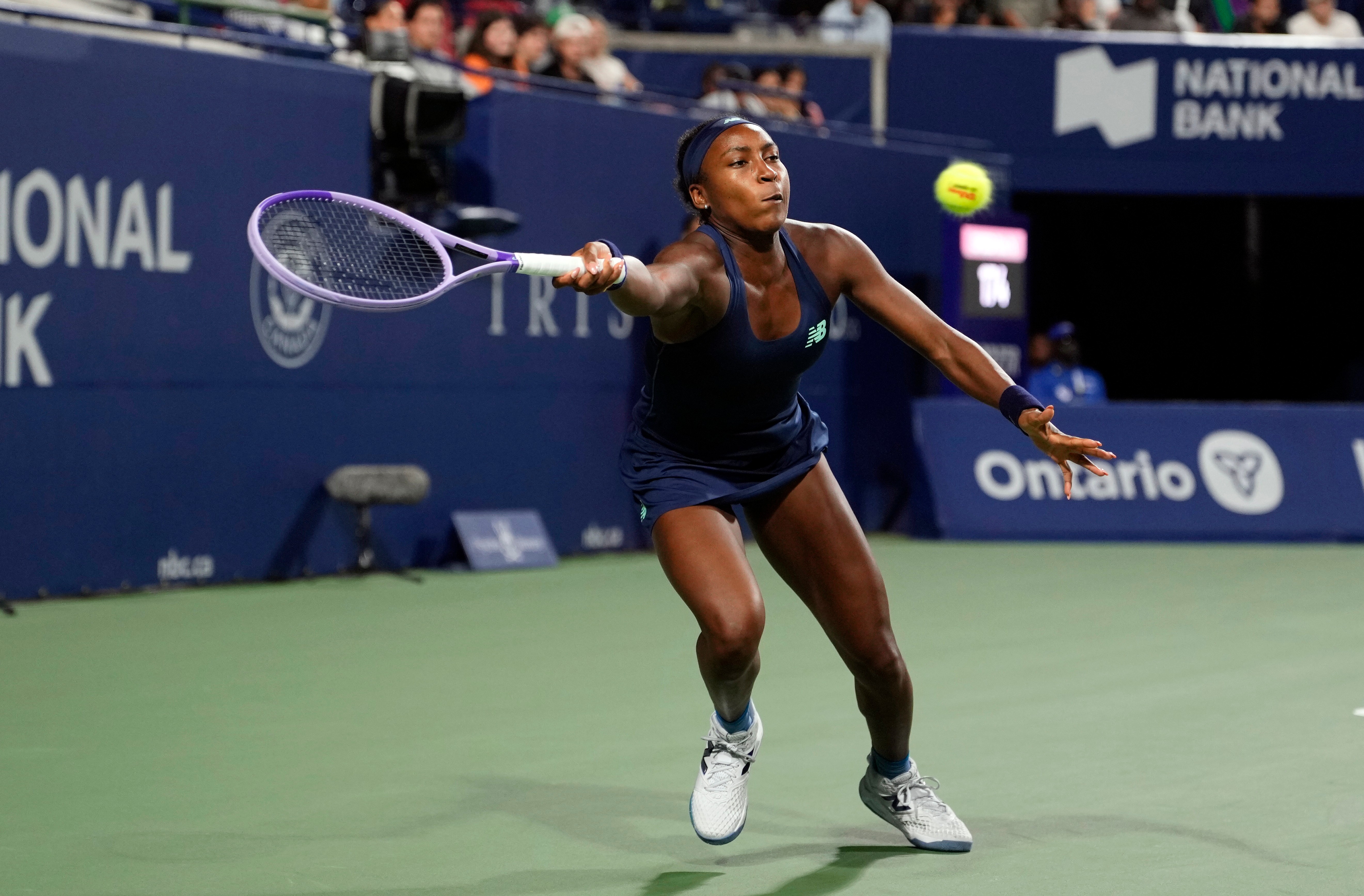 USA's Coco Gauff reaches for the ball against Kazakhstan's Elena Rybakina during a National Bank Open semi final tennis match in Toronto, Wednesday, August 12, 2026. 