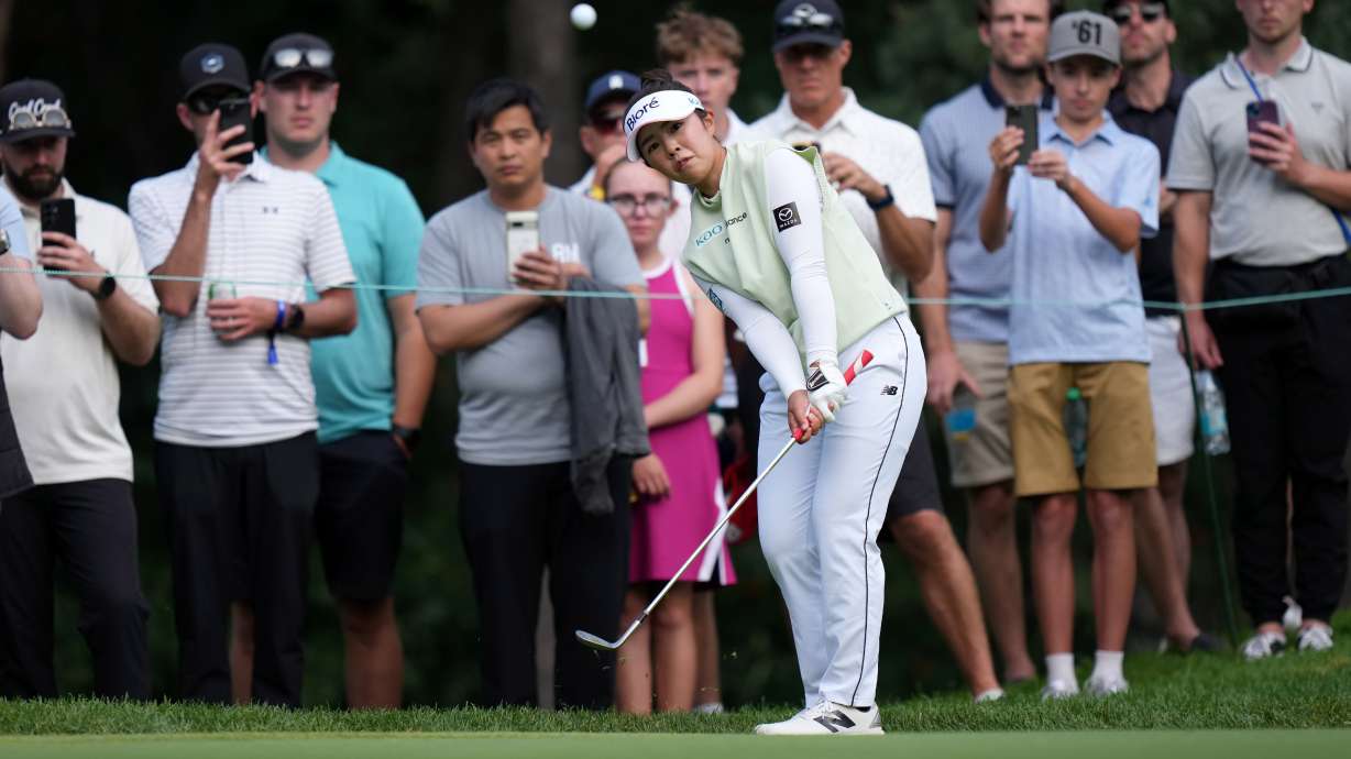 Miyu Yamashita, of Japan, chips onto the 14th green with her third shot during the final round at the LPGA Canadian Women's Open golf tournament in Edmonton, Alberta, Sunday, Aug. 23, 2026.