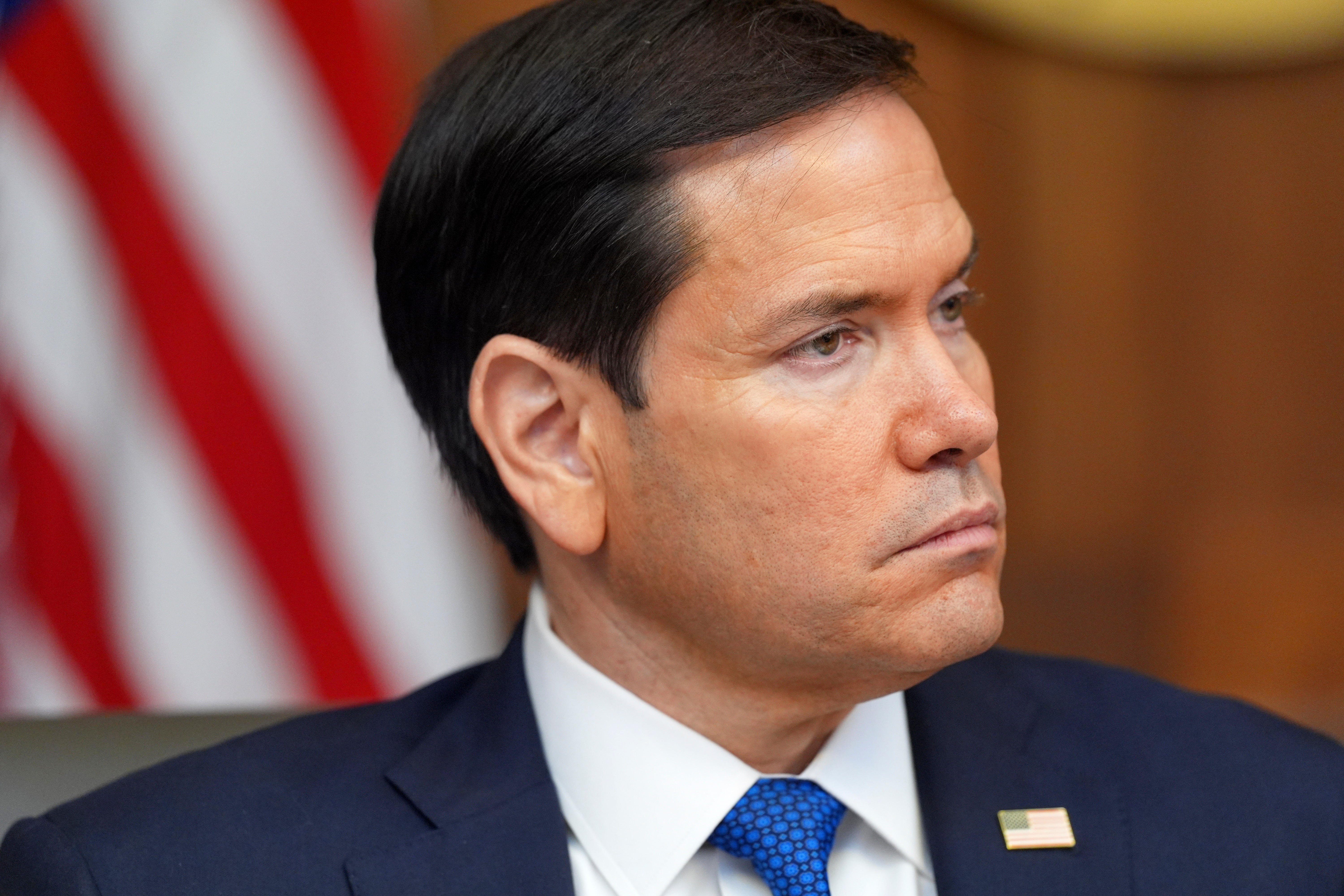 Secretary of State Marco Rubio listens during a cabinet meeting with President Donald Trump, Friday, July 31, at Camp David, the presidential retreat, near Thurmont, Md.