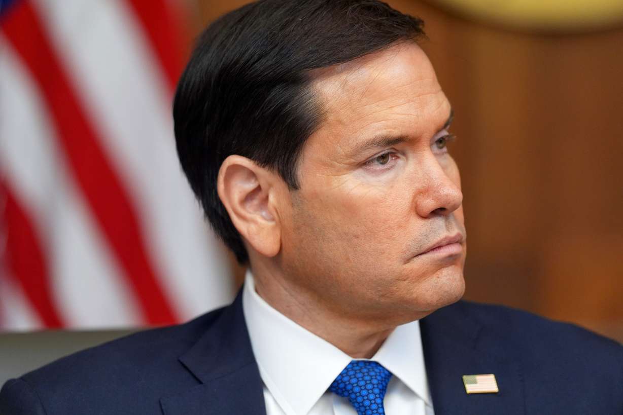 Secretary of State Marco Rubio listens during a cabinet meeting with President Donald Trump, Friday, July 31, at Camp David, the presidential retreat, near Thurmont, Md.