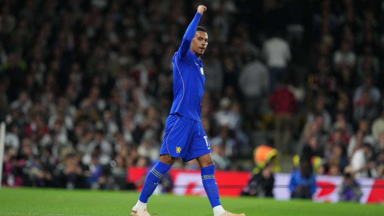 Chelsea's Morgan Rogers celebrates after scoring during the English Premier League soccer match between Fulham and Chelsea in London, Monday, Aug. 24, 2026.