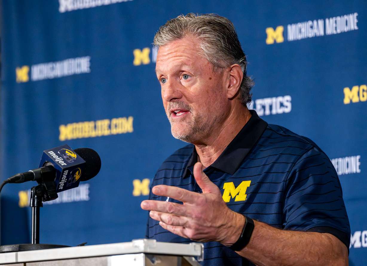 Former University of Utah head football coach Kyle Whittingham speaks after being introduced as the new Michigan head football coach during a press conference at the Hyatt Regency in Orlando, Fla., on Dec. 28, 2025.