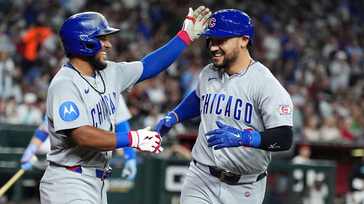 Chicago Cubs' Michael Conforto, right, celebrates his two-run home run against the Arizona Diamondbacks with Cubs' Pedro Ramírez during the sixth inning of a baseball game, Monday, Aug. 24, 2026, in Phoenix.