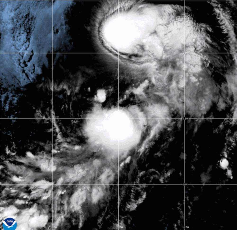 This satellite image released by NOAA shows the Tropical Storms Iselle, top, and Julio, bottom, over the Pacific Ocean, Tuesday, Aug. 25, 2026. 