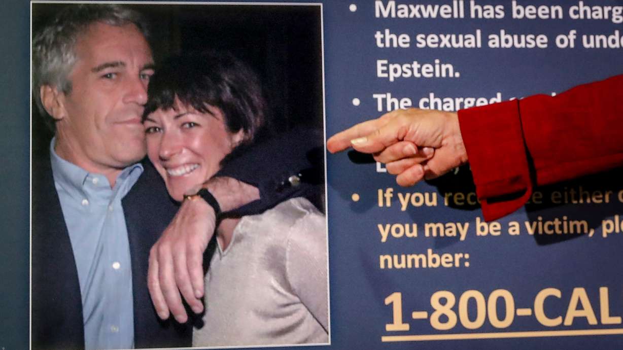 Audrey Strauss, acting U.S. attorney for the Southern District of New York, points to a photo of Jeffrey Epstein and Ghislaine Maxwell during a news conference in New York on July 2, 2020.