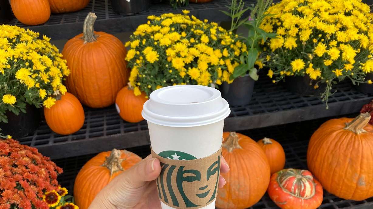 A Starbucks Pumpkin Spice Latte. The coffee chain's fall favorite returns to shops on Tuesday.